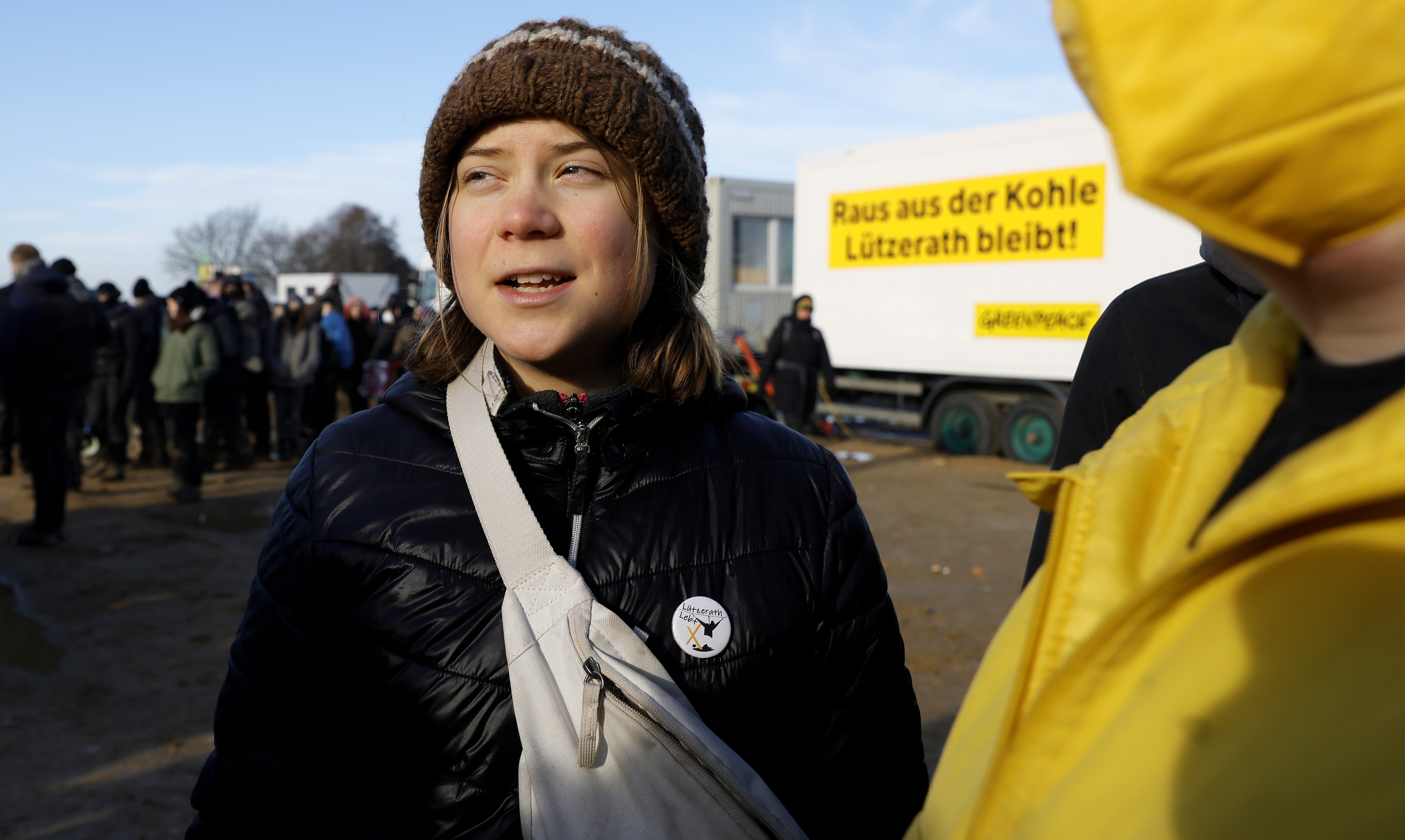 Police officers detain climate activist Greta Thunberg