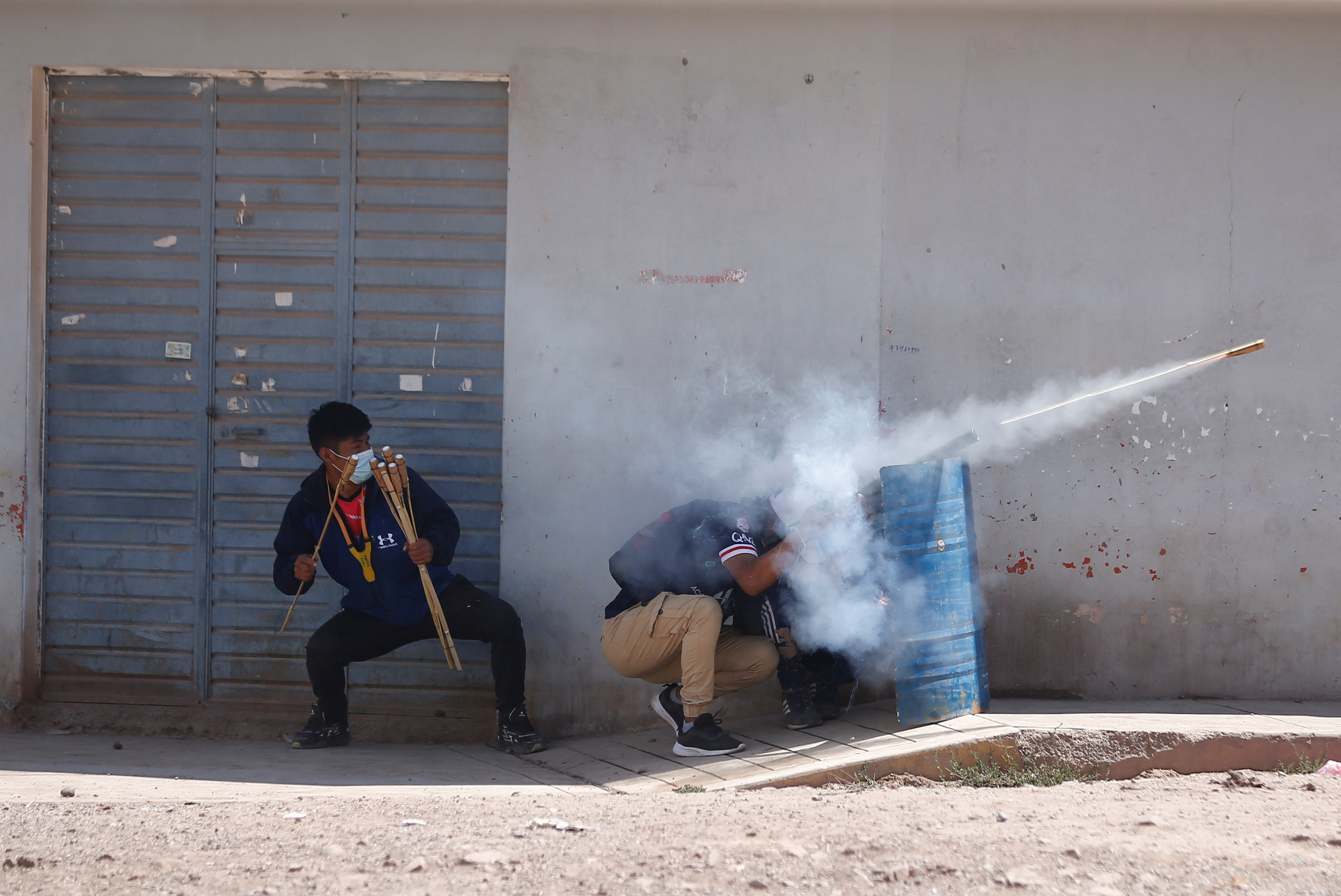 Riot police clash with anti-government protesters