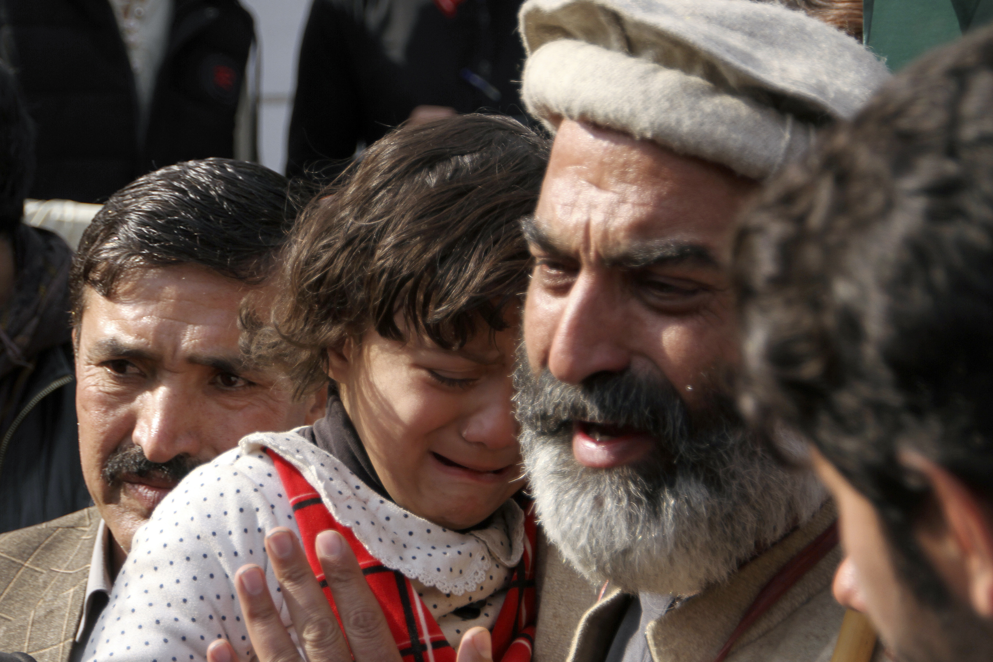 Family members of the victims of Peshawar blast.