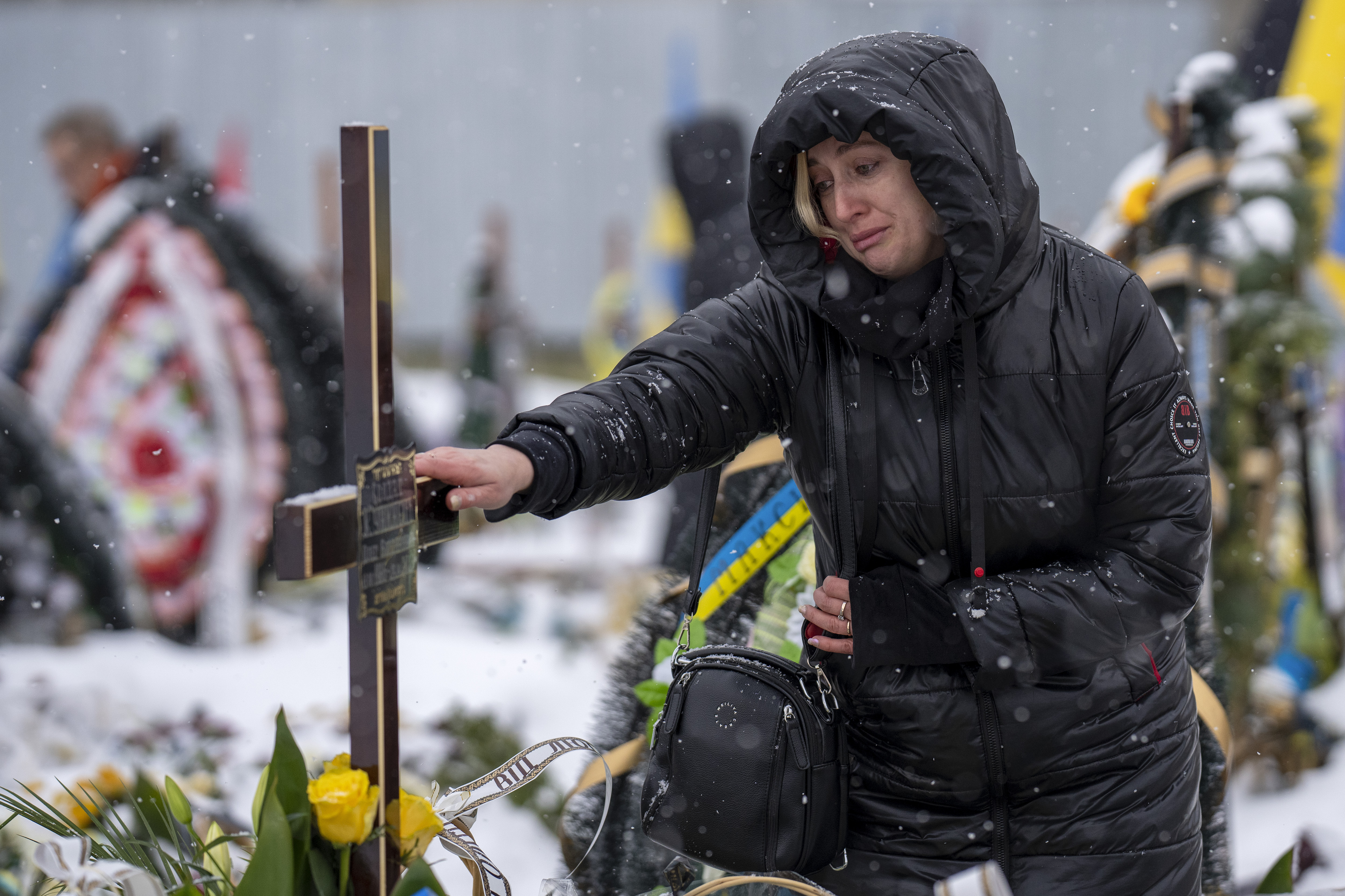 Woman visits a grave