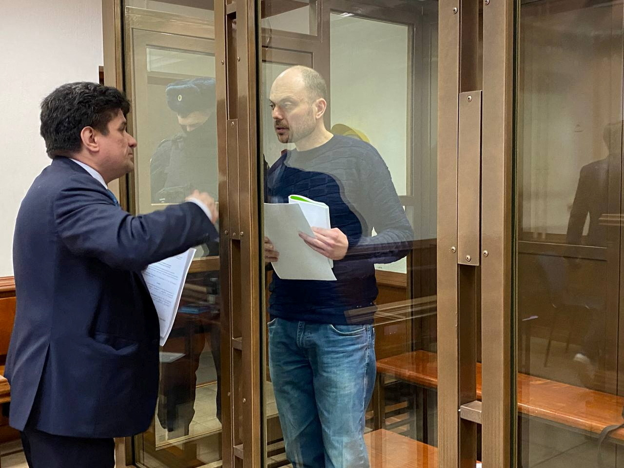 Russian opposition leader Vladimir Kara-Murza, accused of treason, collaboration with an "undesirable organisation" and spreading false information about the actions of the Russian armed forces, talks to his lawyer Vadim Prokhorov during a preliminary court hearing in Moscow, Russia March 6, 2023. Press Service of Moscow City Court/Handout via REUTERS ATTENTION EDITORS - THIS IMAGE WAS PROVIDED BY A THIRD PARTY. NO RESALES. NO ARCHIVES. MANDATORY CREDIT.