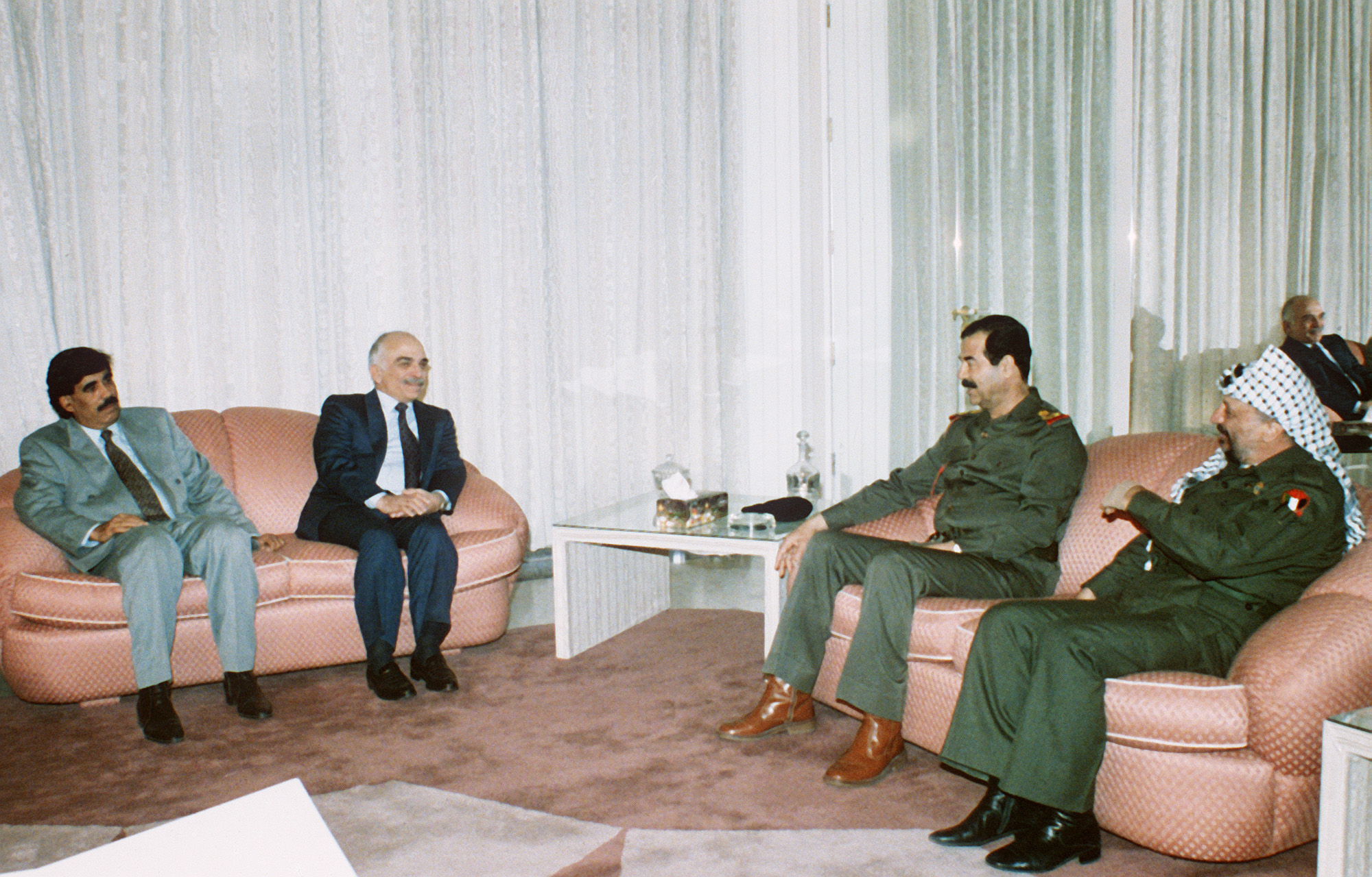 From left to right, Yemeni Vice-President Ali Salem Al Beidh, King Hussein of Jordan, Iraqi President Saddam Hussein and PLO head Yasser Arafat meet for talks in Baghdad on December 8, 1990 [AP Photo]