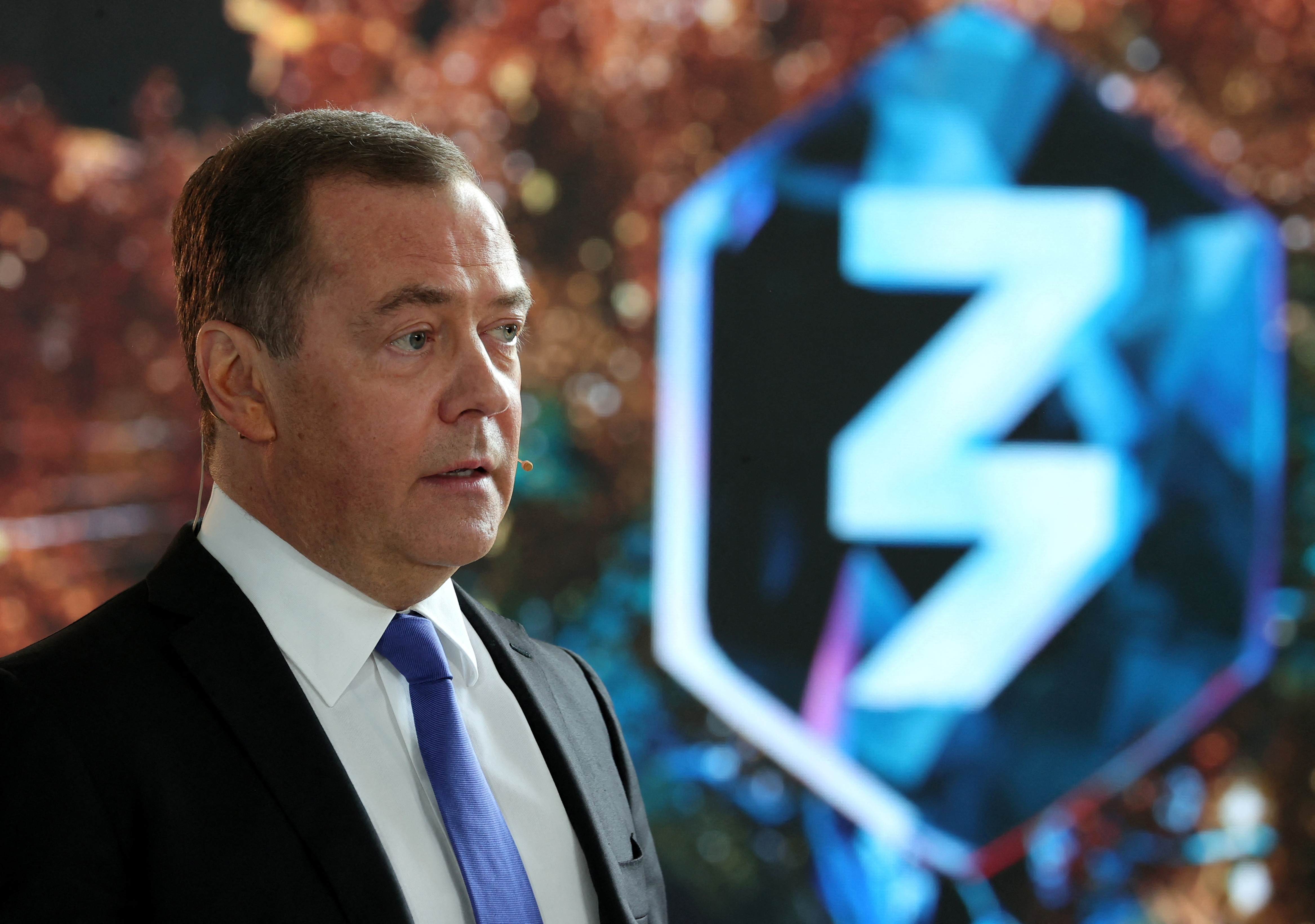 Deputy head of Russia's Security Council Dmitry Medvedev takes part in Znaniye educational marathon via a video link during a meeting with officials and employees of the military industrial corporation "Scientific and Production Machine Building Association" in the town of Reutov in the Moscow region, Russia, April 25, 2023. Sputnik/Yekaterina Shtukina/Pool via REUTERS ATTENTION EDITORS - THIS IMAGE WAS PROVIDED BY A THIRD PARTY