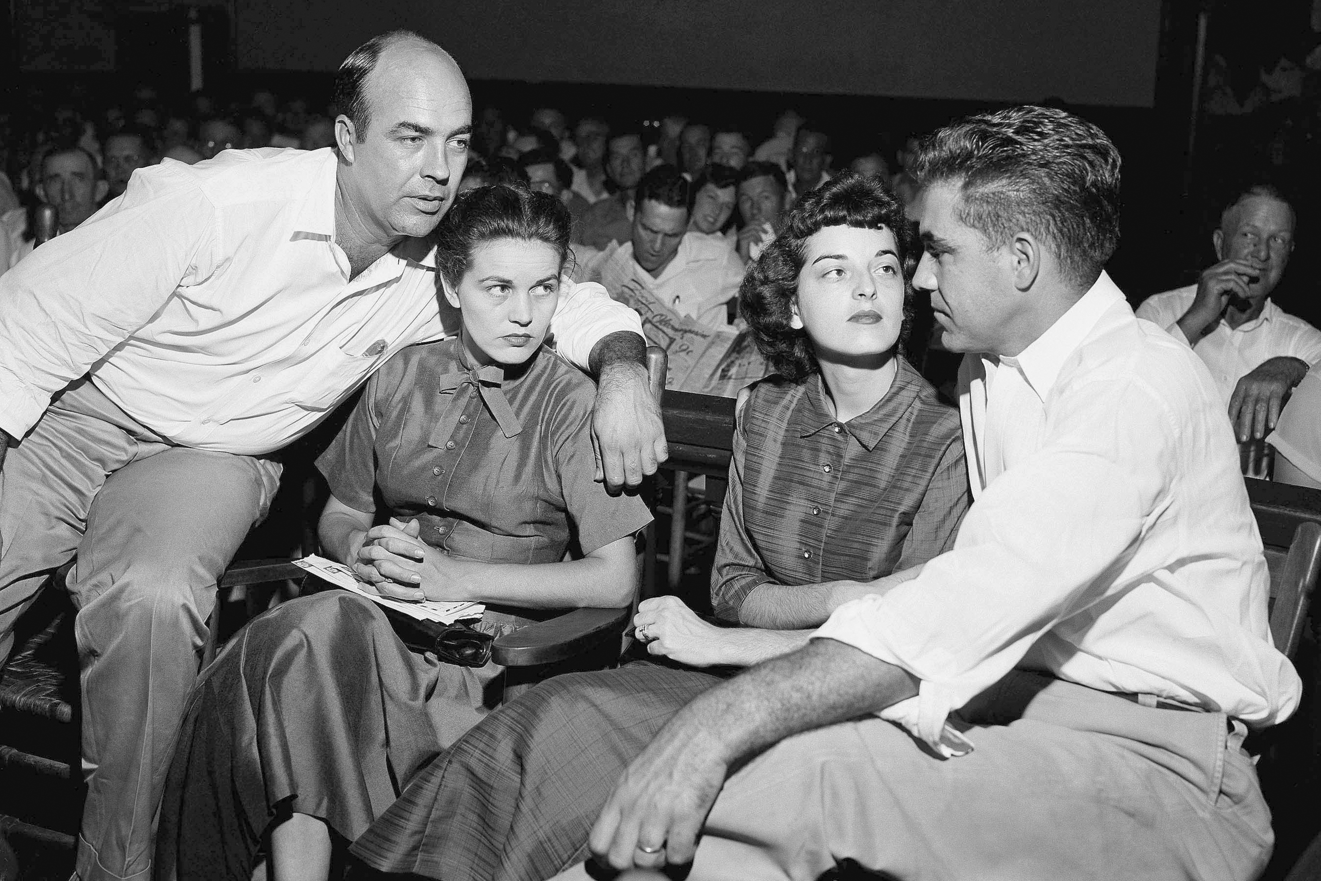 JW Milam (from left), his wife, Carolyn Bryant Donham and Roy Bryant sit in a courtroom in Sumner, Mississippi