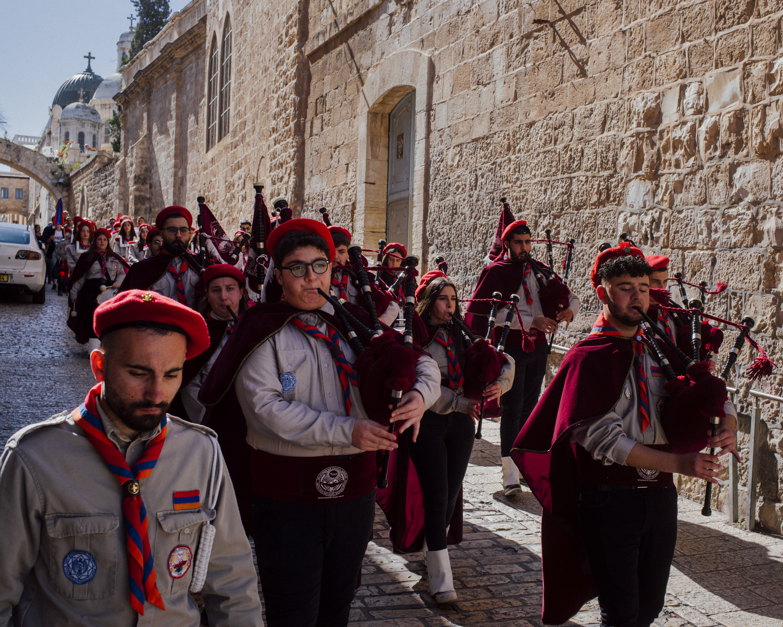 The Armenian scouts march through the old city