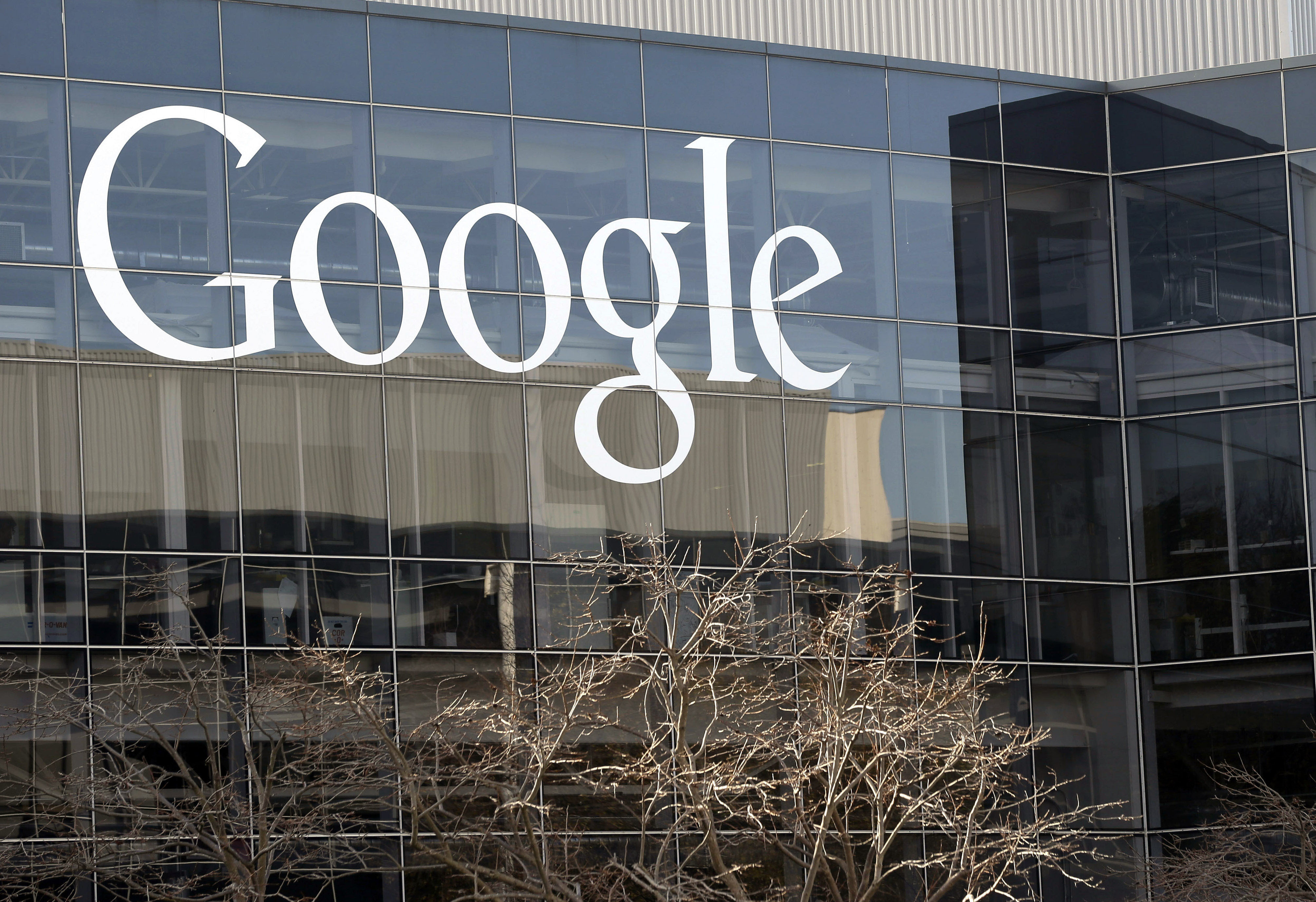 A Google sign on a window at its headquarters in Mountain View, California