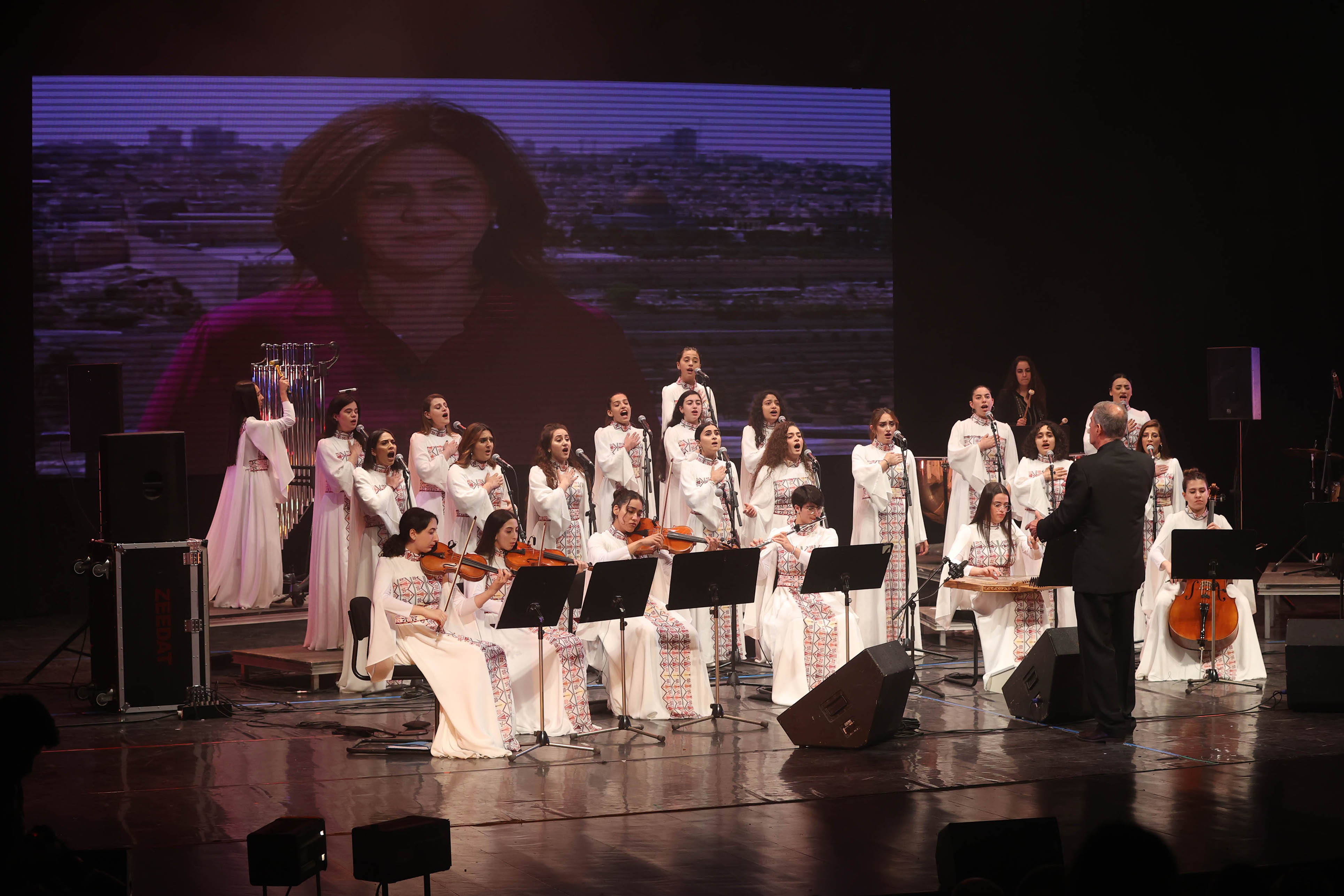 The Edward Said National Conservatory Daughters of Jerusalem orchestra performing songs dedicated to Shireen and to Palestinians during the ceremony on May 9, 2023 [Al Jazeera]