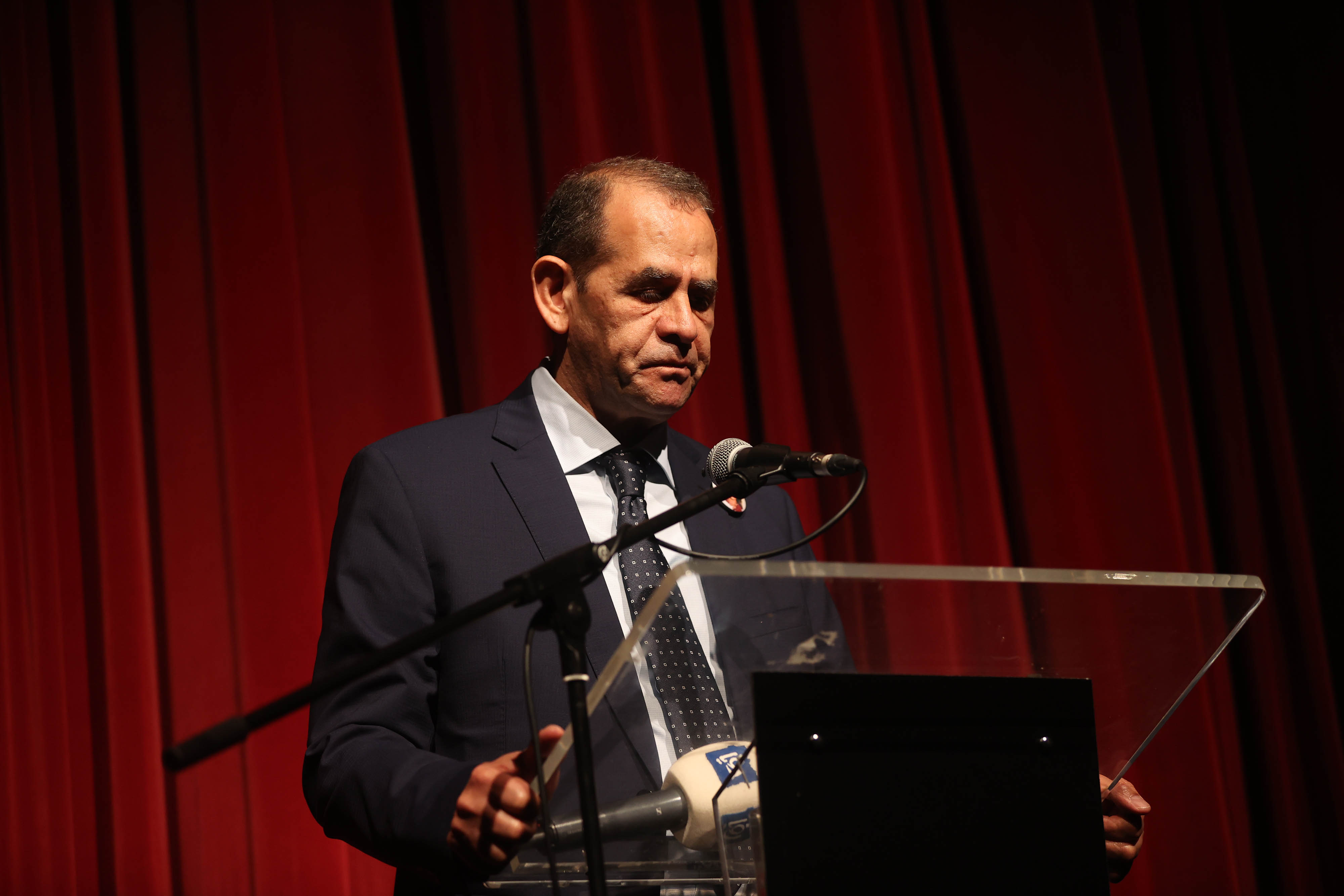 Tony Abu Akleh, Shireen’s brother, speaking at the memorial ceremony on Tuesday night [Al Jazeera]
