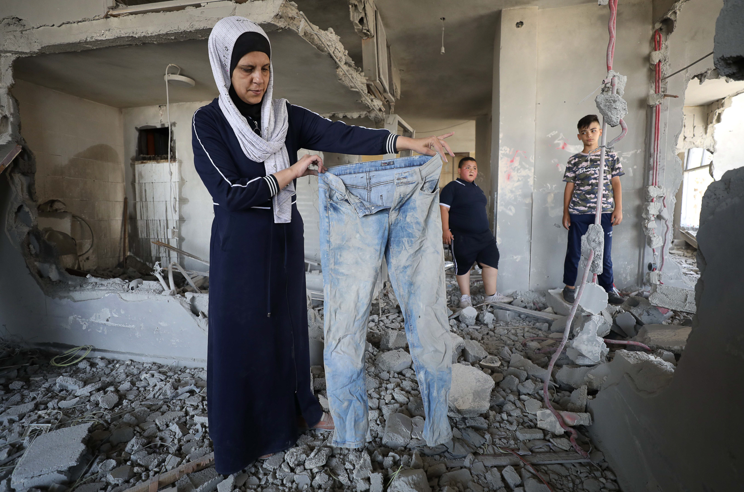 ‘Agonising pain … when I put away the boys’ clothes,’ Tamara says, holding up a pair of jeans that was left behind