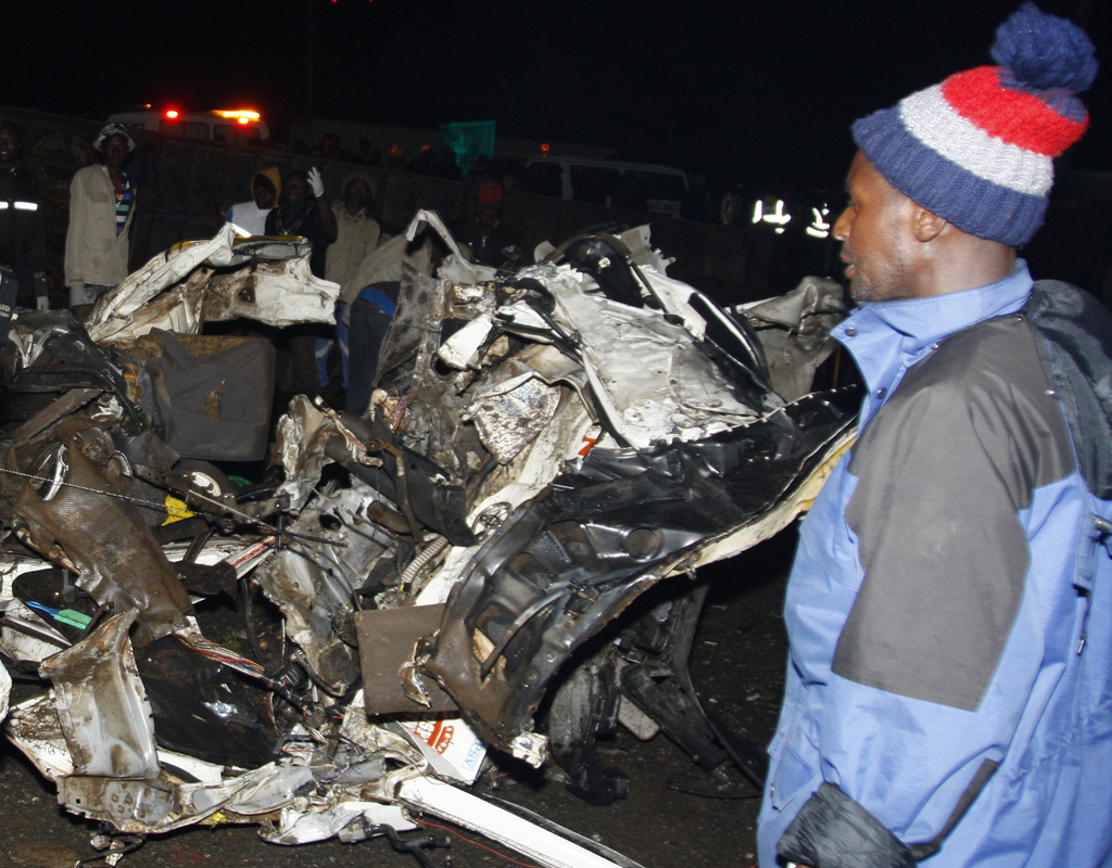 Wreckage of vehicles after the accident Saturday, July 1, 2023. At least 45 people were killed Friday when a truck rammed into several other vehicles and market traders in western Kenya, police said. The Friday evening accident occurred at a location known for crashes near the Rift Valley town of Londiani, which is about 200 kilometers (125 miles) northwest of the capital, Nairobi. (AP Photo)