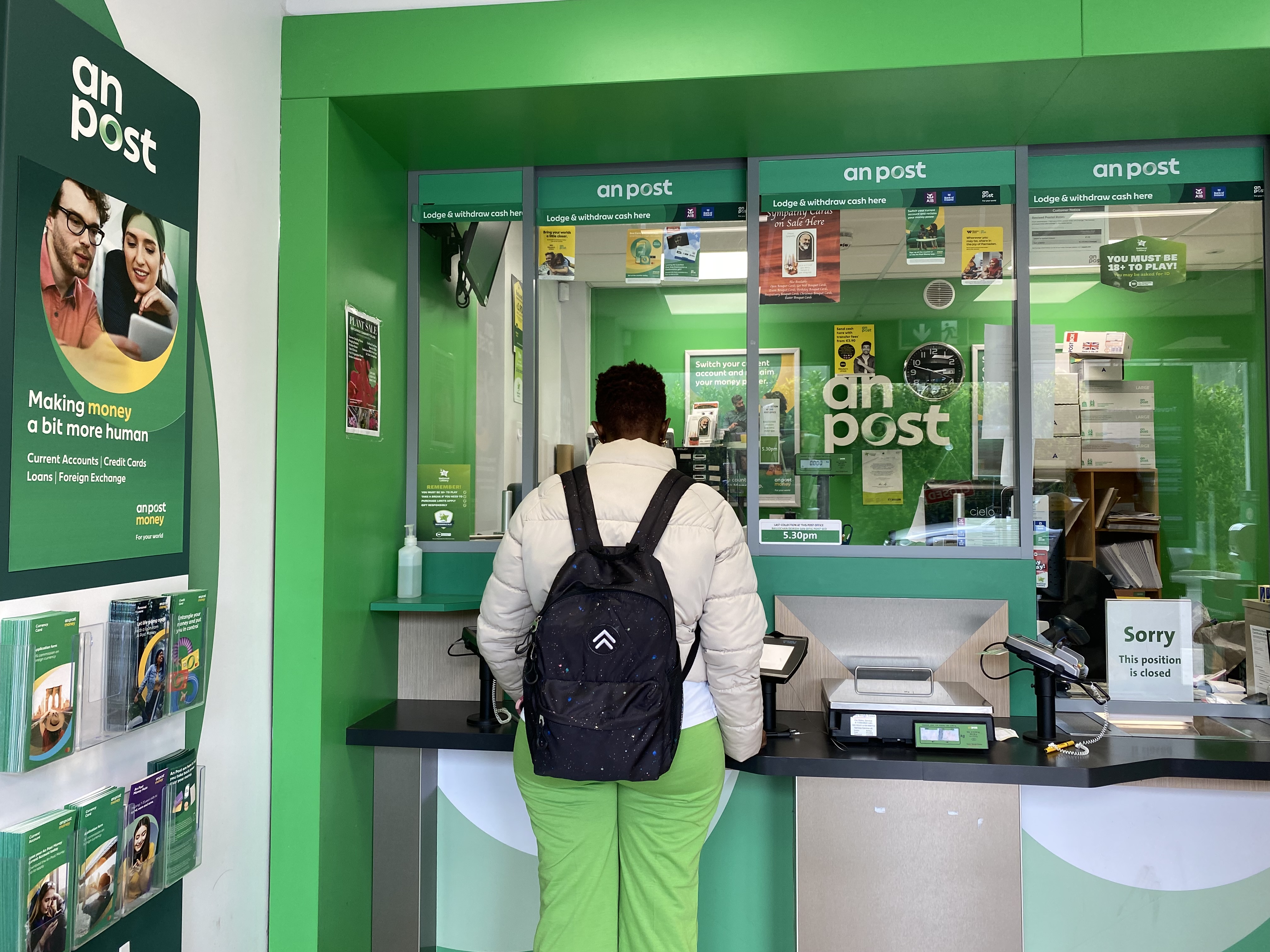 Fatama collects her asylum seeker grant at the post office