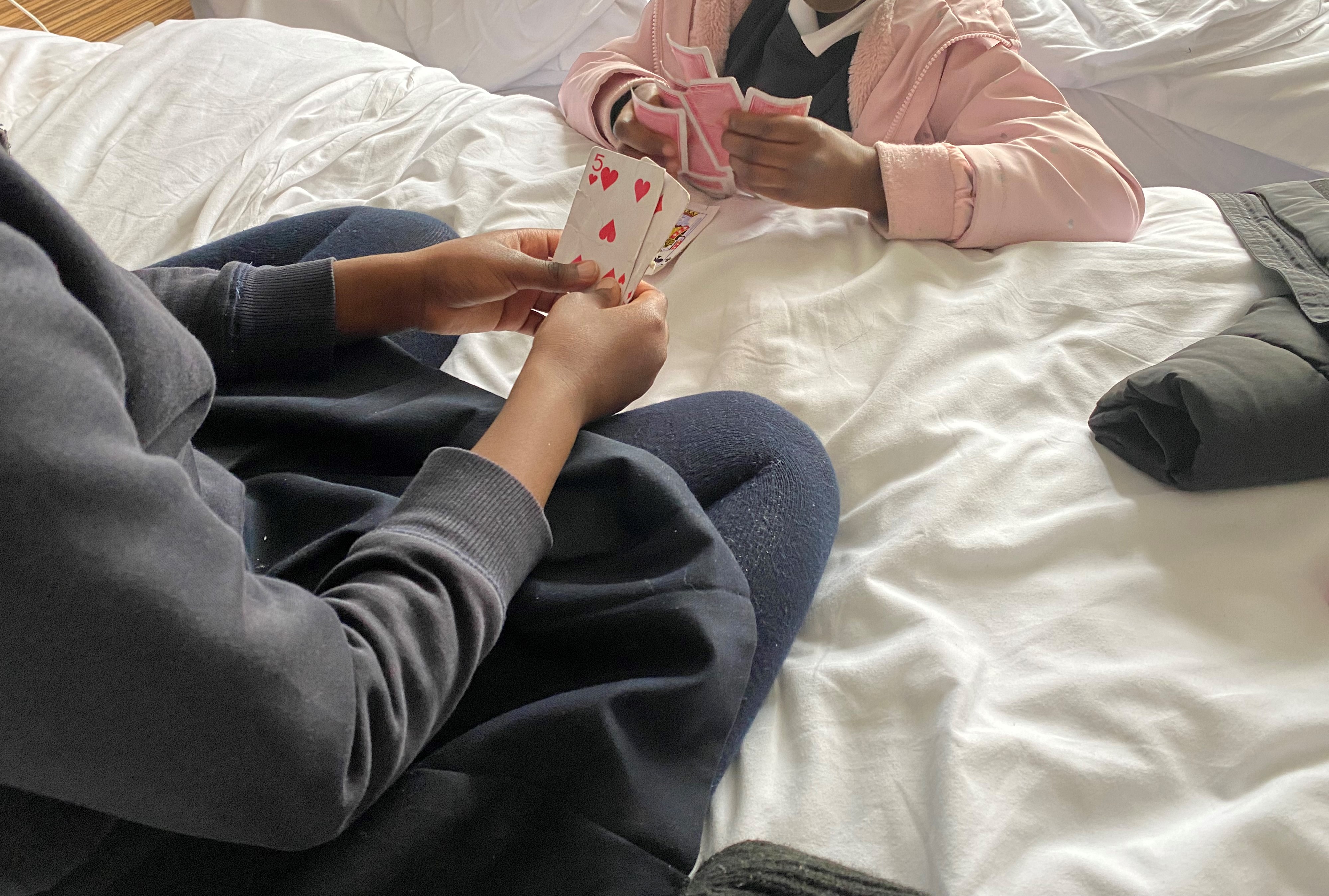 Amina and Aminata play a game of cards