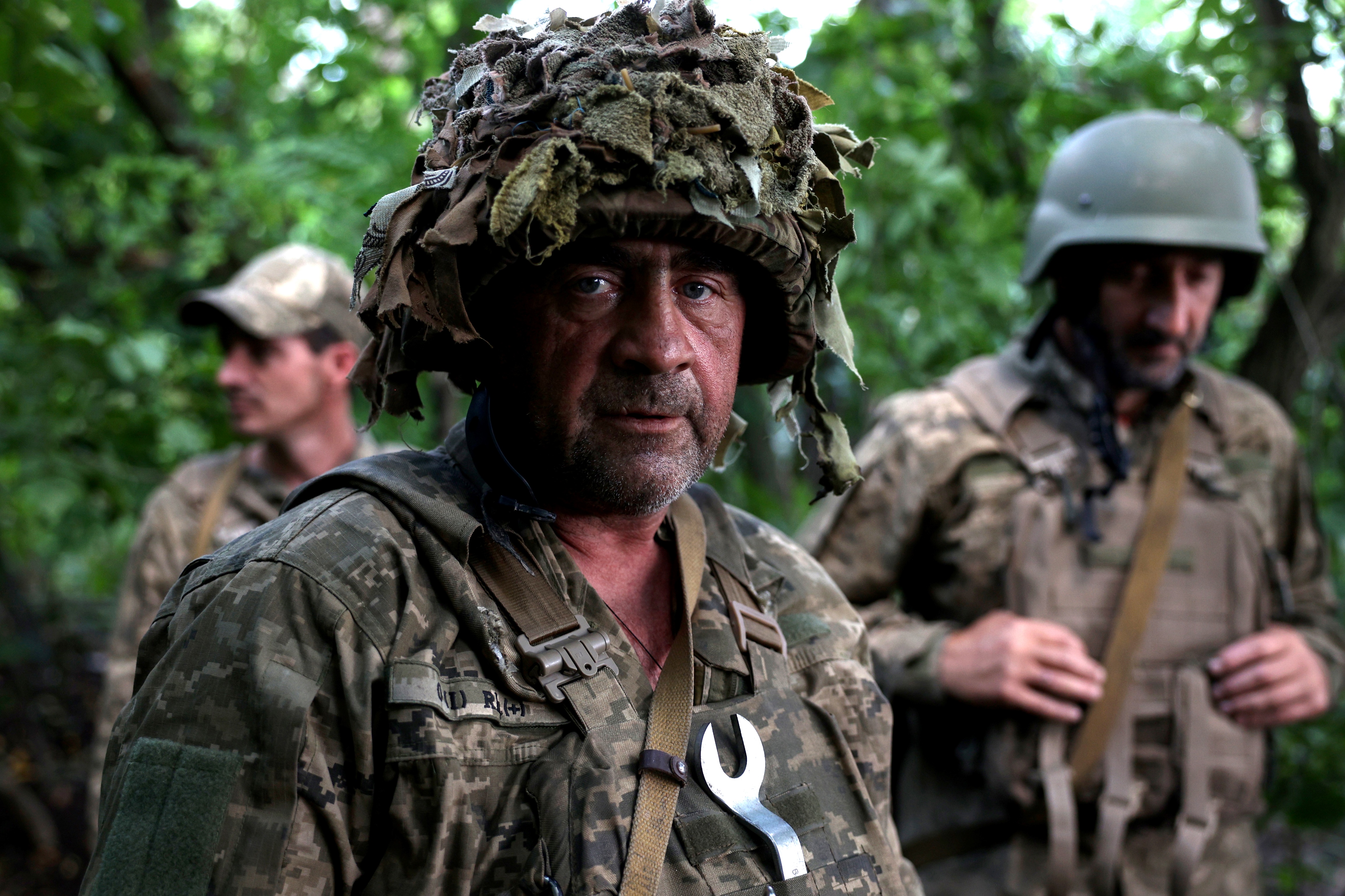 A Ukrainian artilleryman poses as he holds a position at the front line near the town of Bakhmut, Donetsk region, on July 15, 2023, amid the Russian invasion of Ukraine