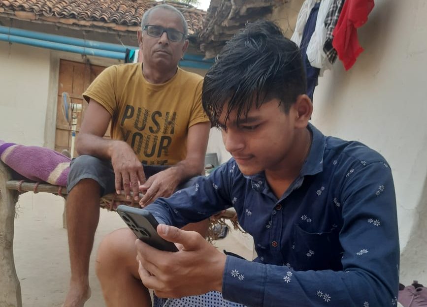 Prateek Kumar with his father