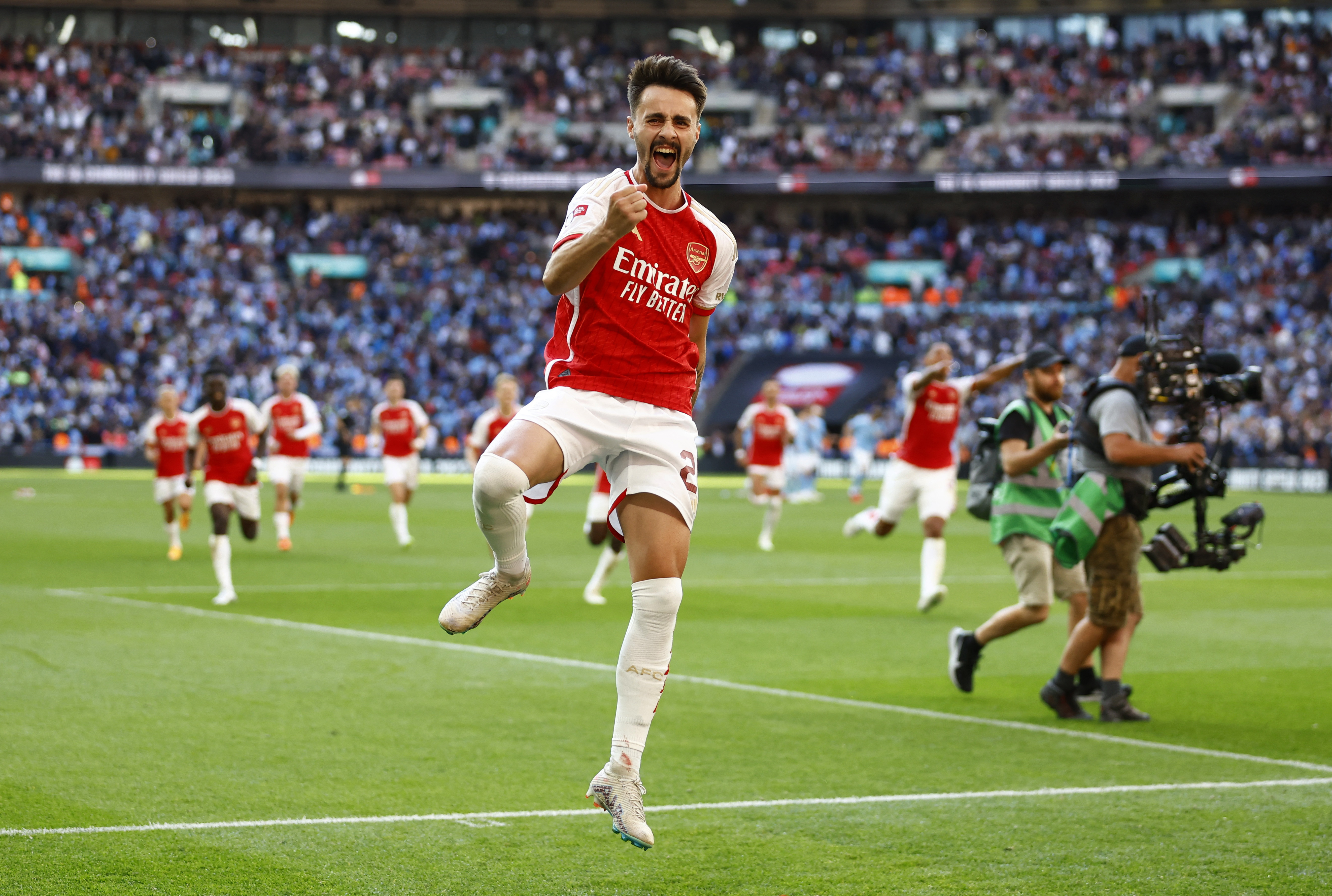 Arsenal's Fabio Vieira celebrates scoring a penalty 