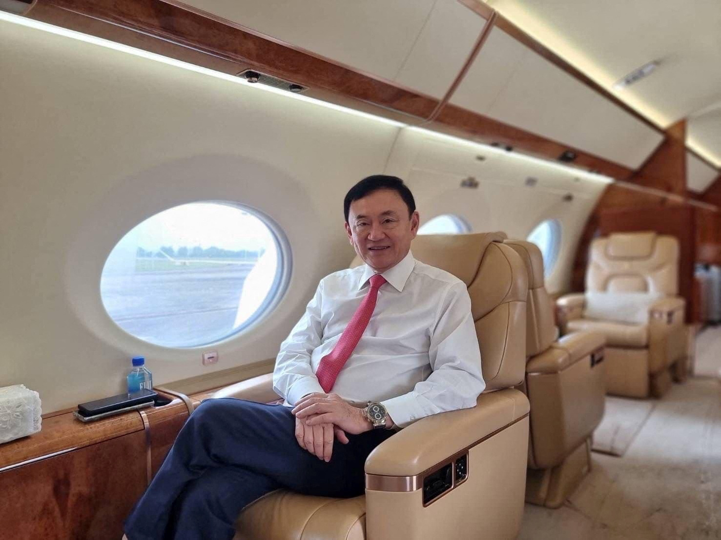 Thaksin returned from self-imposed exile on a private jet from Singapore