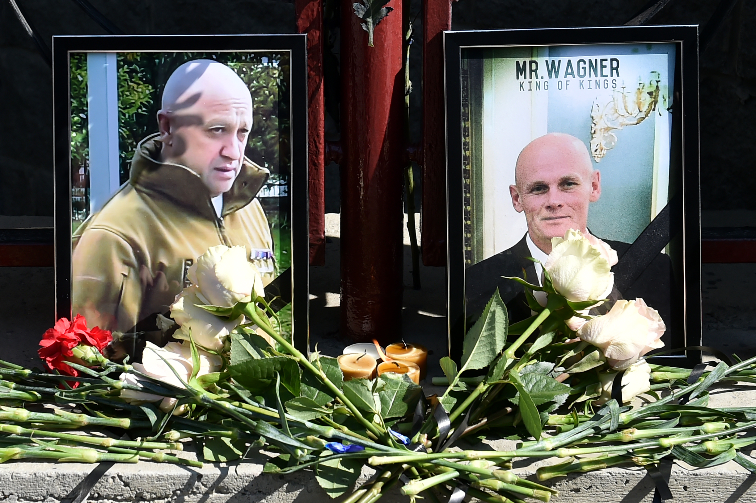 Portraits of Yevgeny Prigozhin (L) and Dmitry Utkin (R)