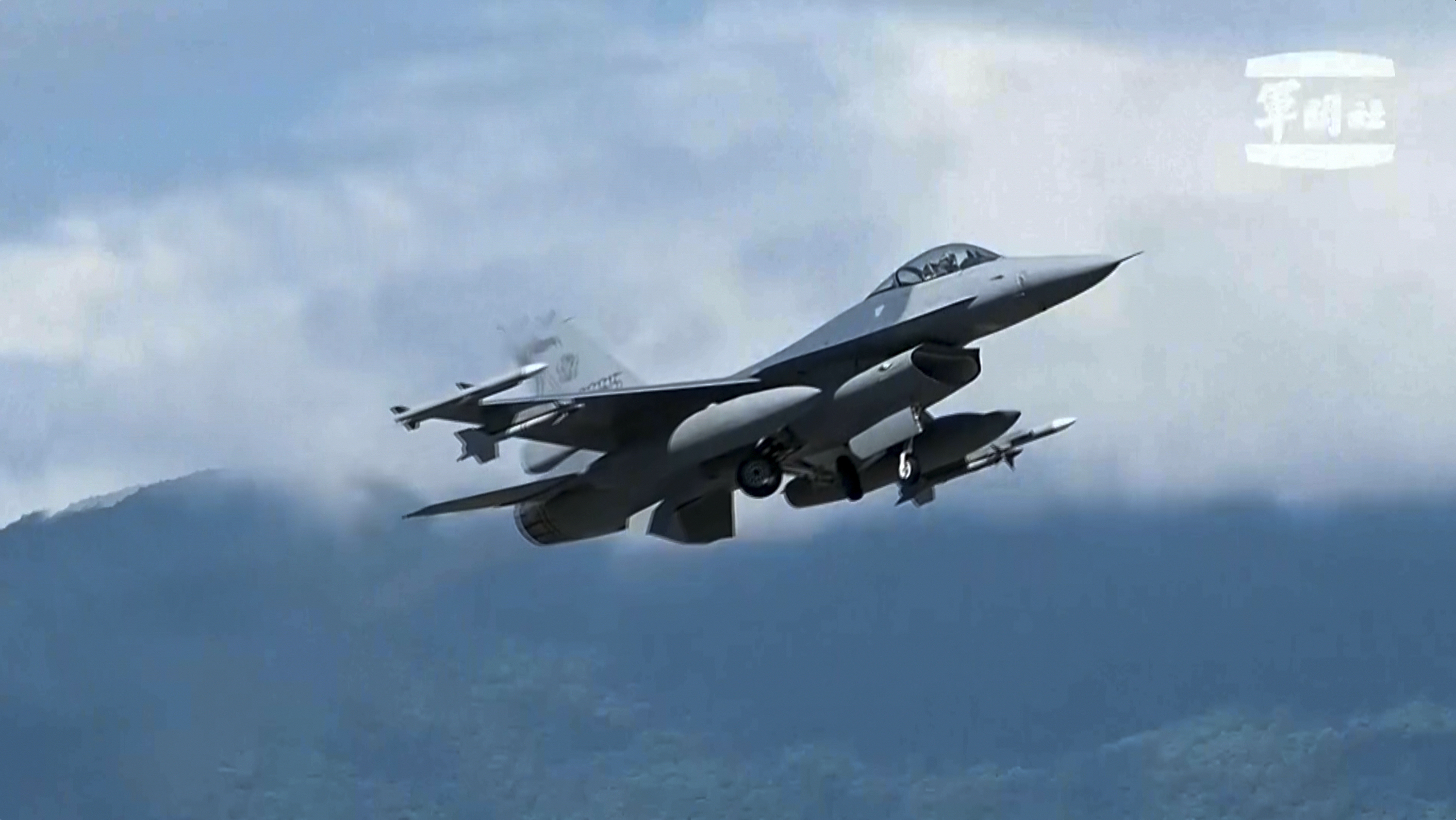 In this grab from video released by the Taiwan Military News Agency, a F-16s takes off from Hualien Airbase in Taiwan's southeastern Hualien county, Sunday, Aug. 20, 2023. Taiwan deployed aircraft and vessels and activated land-based missile systems after the Chinese military launched drills around Taiwan on Saturday as a "stern warning" over what it called collusion between "separatists and foreign forces," its defense ministry said, days after the island's vice president stopped over in the United States. (Taiwan Military News Agency via AP)
