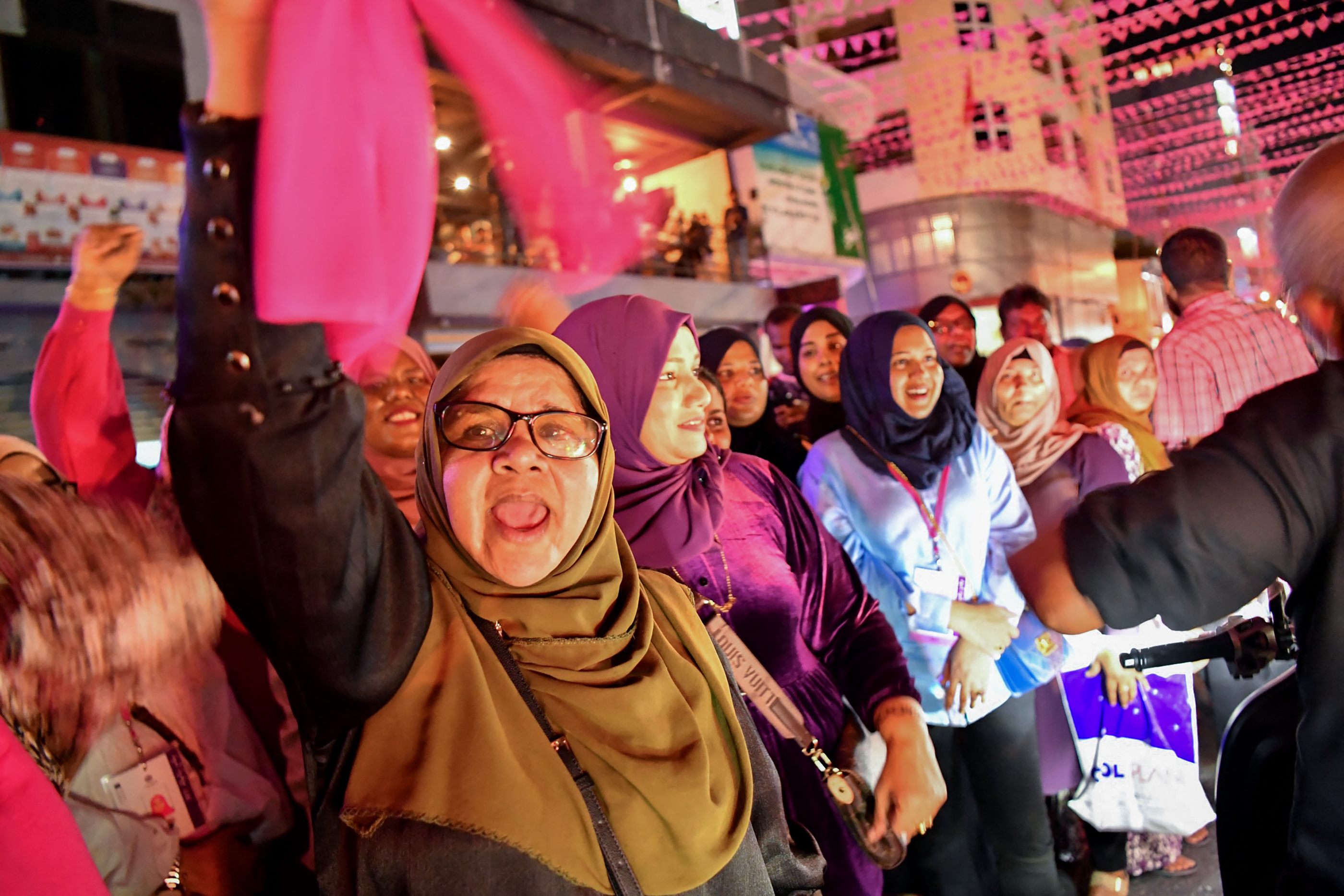 Supporters of Muizzu's People's National Congress celebrate on the streets and call for the release of former president Abdulla Yameen.