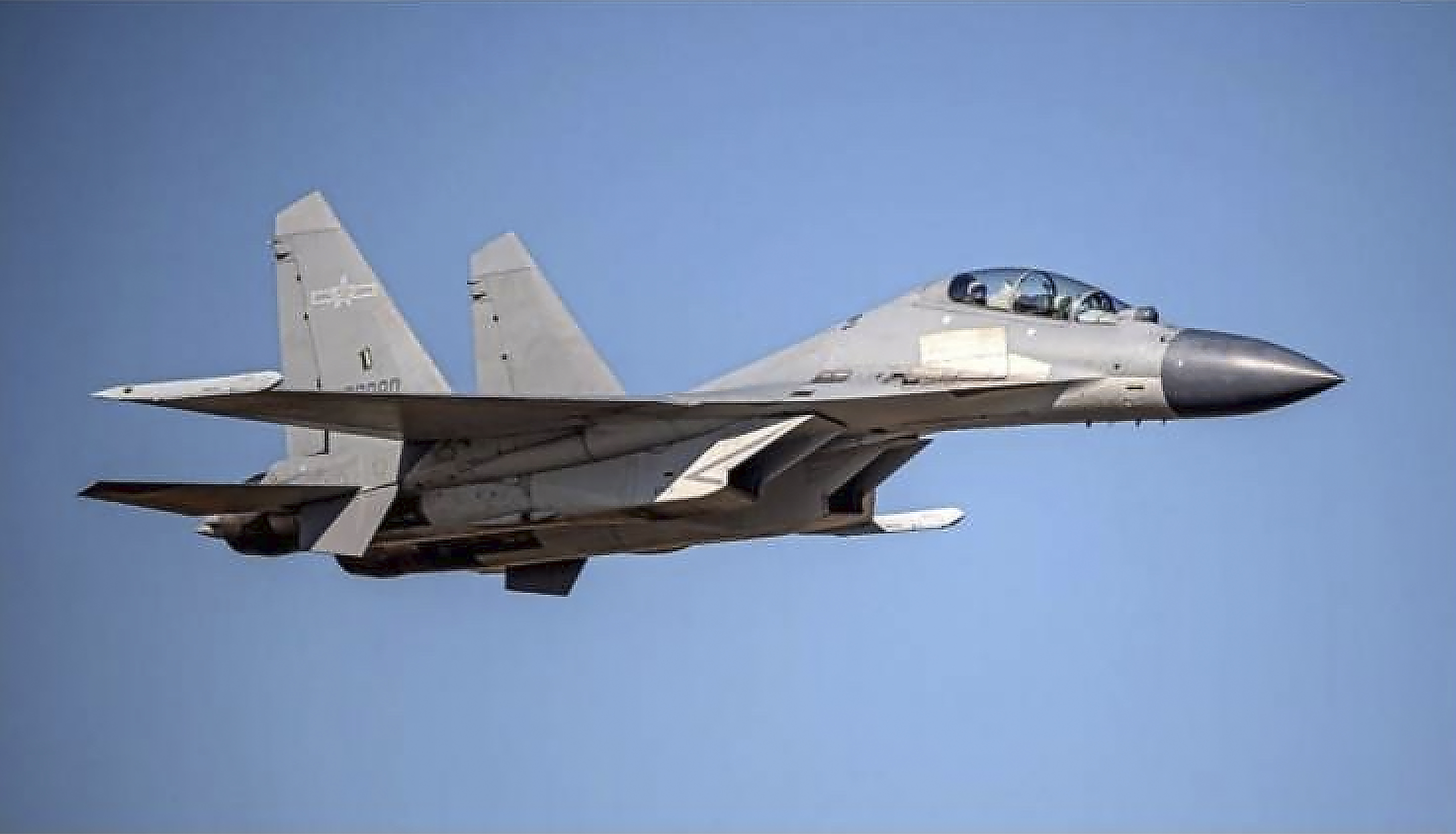 In this undated photo, a Chinese PLA J-16 fighter jet flies in an undisclosed location [Handout: Taiwan Ministry of Defense via AP]
