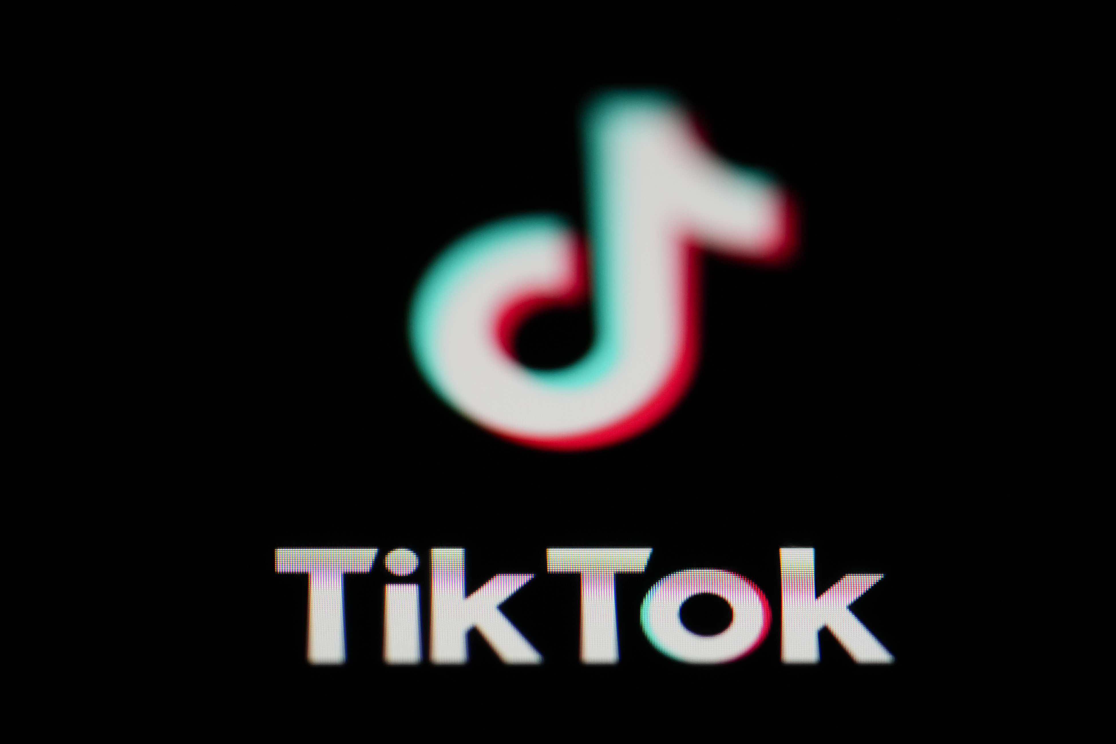 The icon for the video sharing TikTok app is seen on a smartphone, on Feb. 28, 2023.
