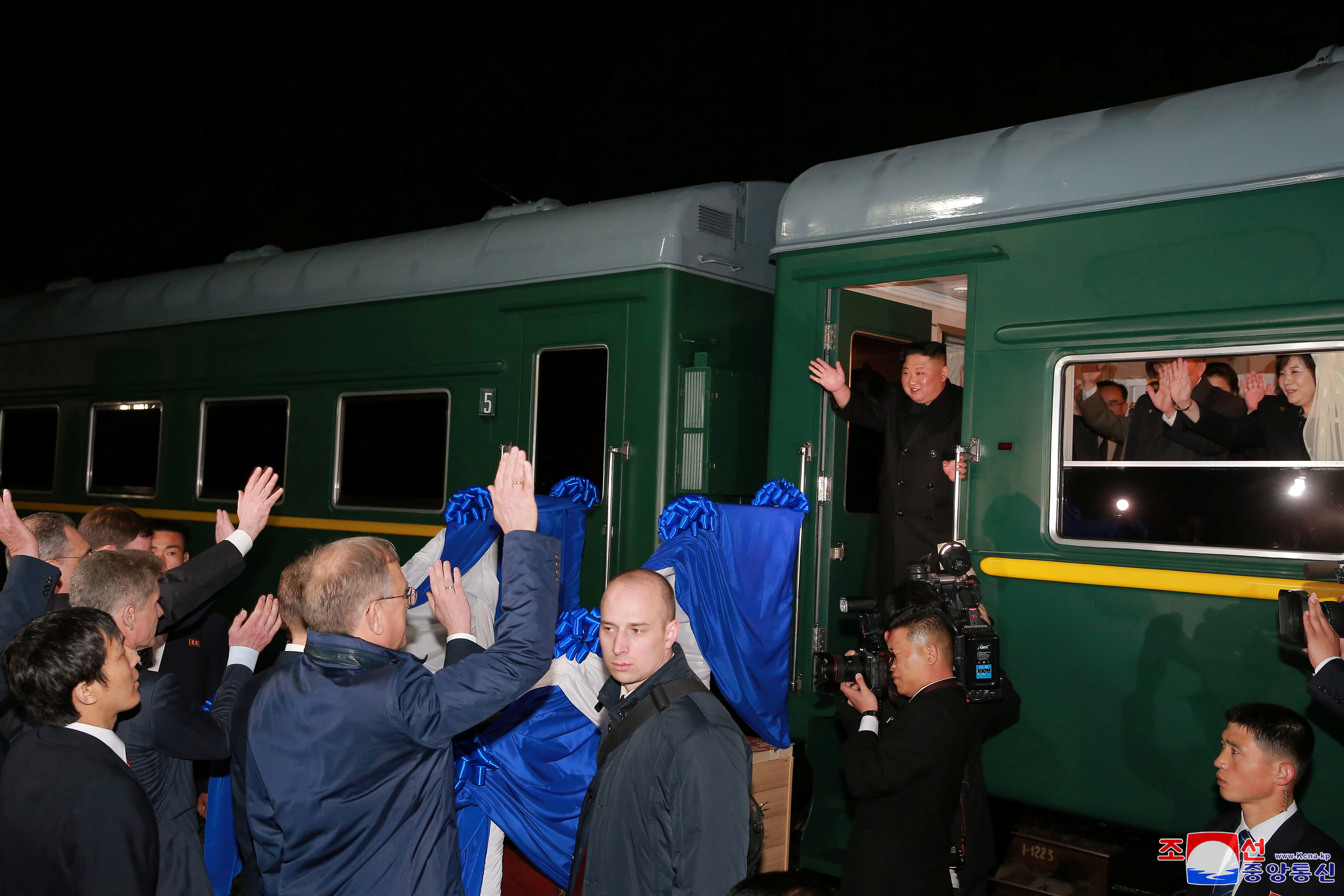 Kim Jong Un waves from his train at the end of his visit to Russia in 2019 [KCNA via Reuters]