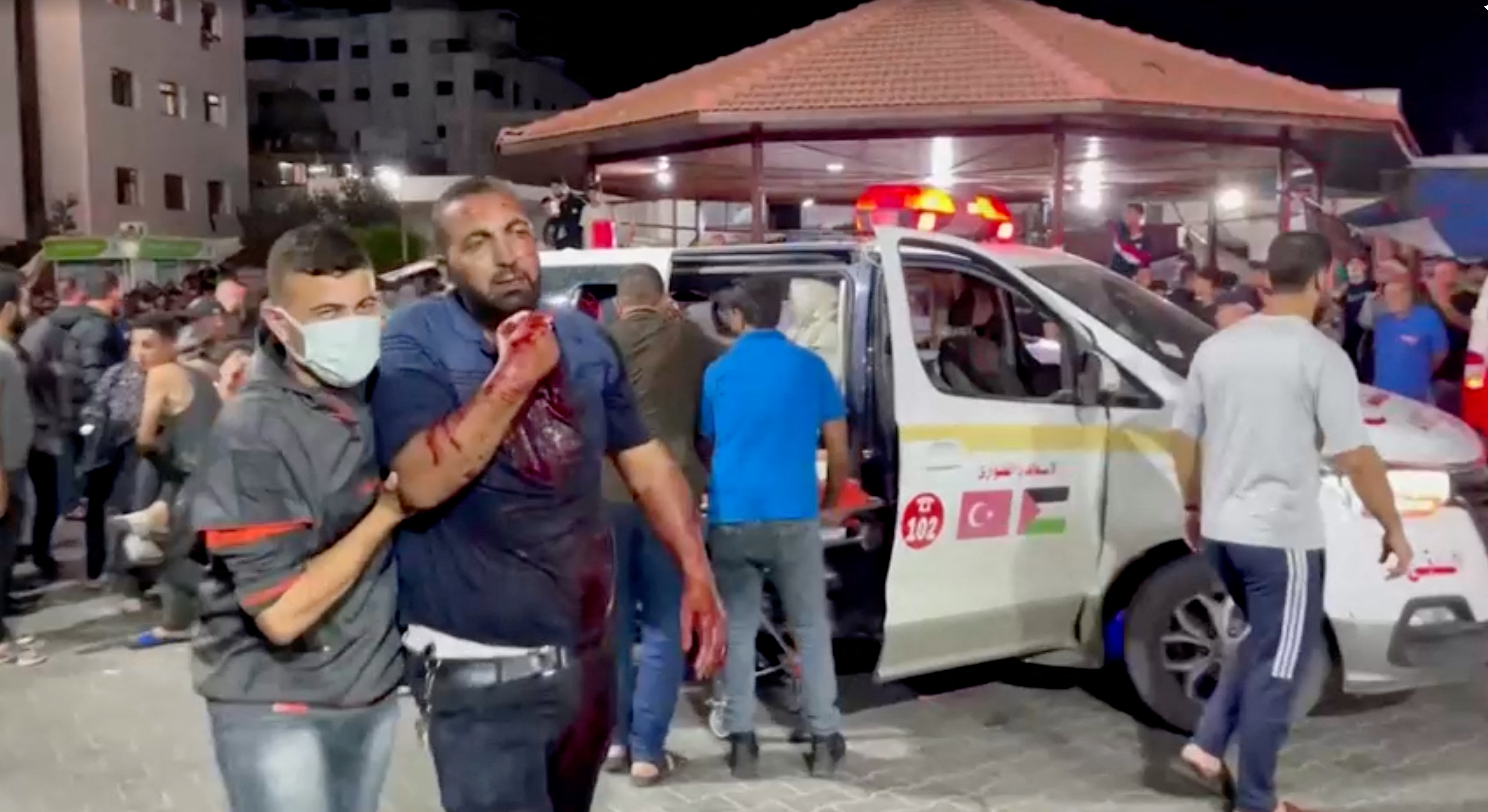 An injured person is taken into a hospital after Israeli air strike hit a hospital