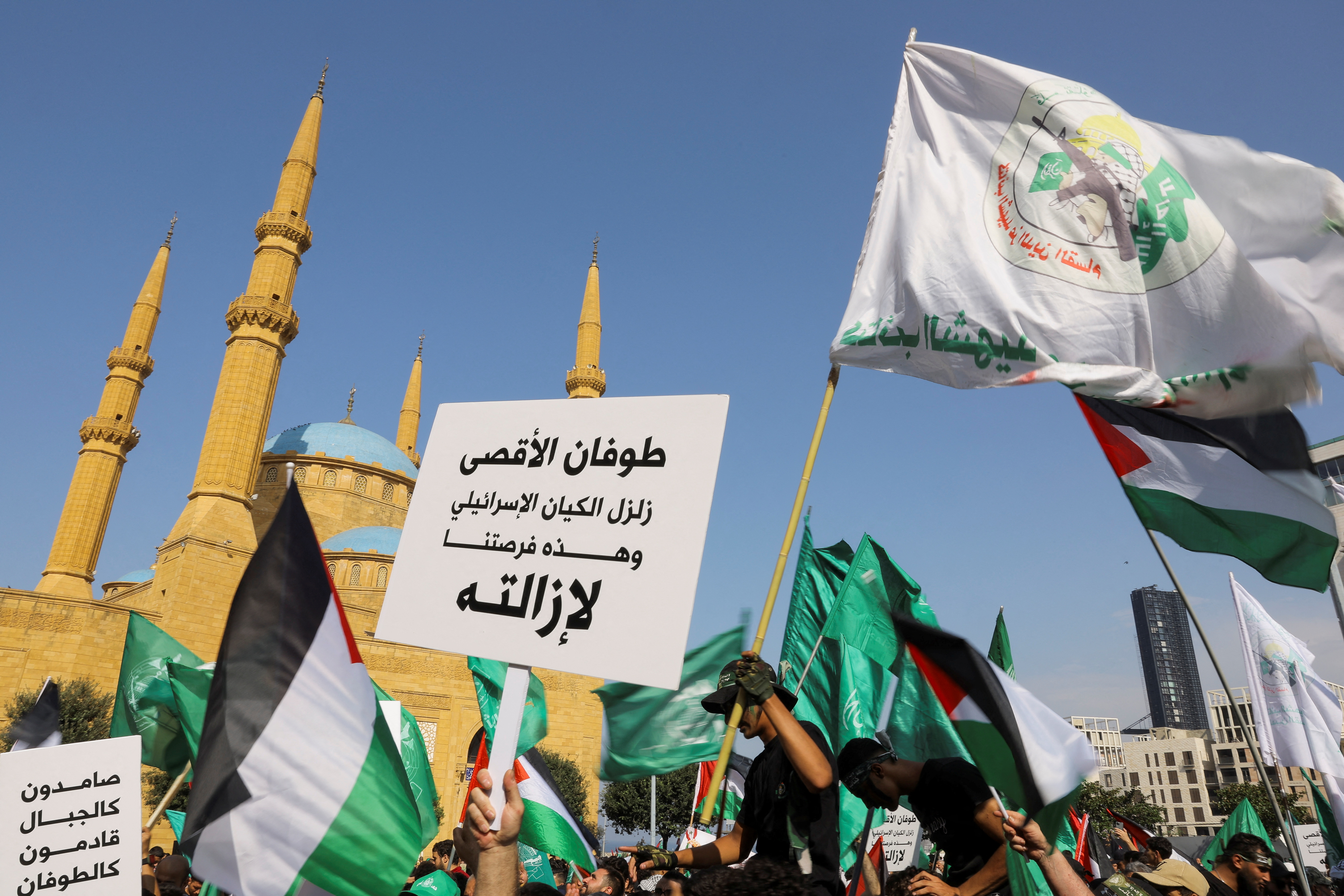 Protesters show support for Palestinians facing Israeli bombardment in Gaza on October 29 outside of the Al-Amin Mosque in Beirut, Lebanon