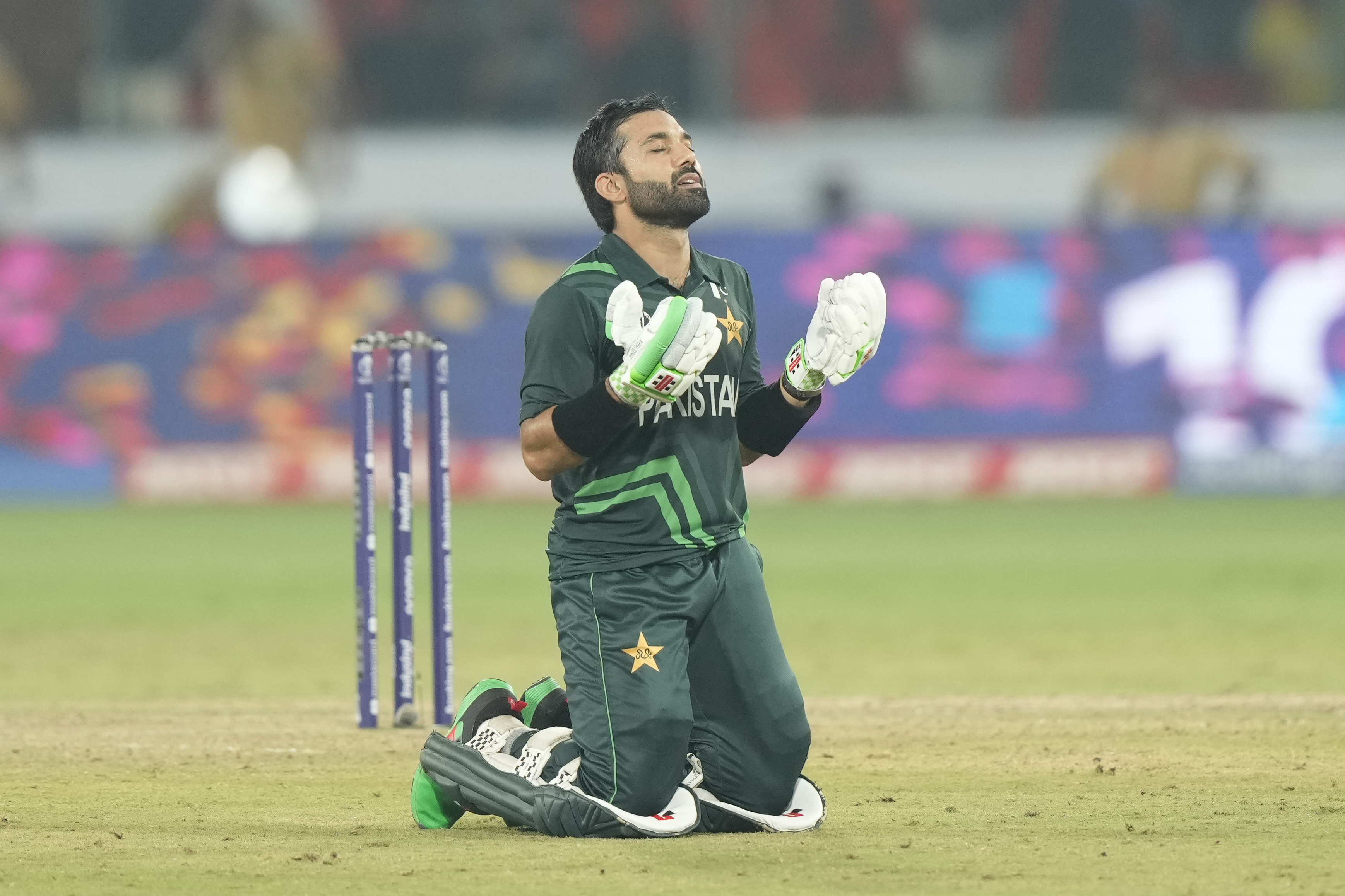 Pakistan's Mohammad Rizwan celebrates scoring a century