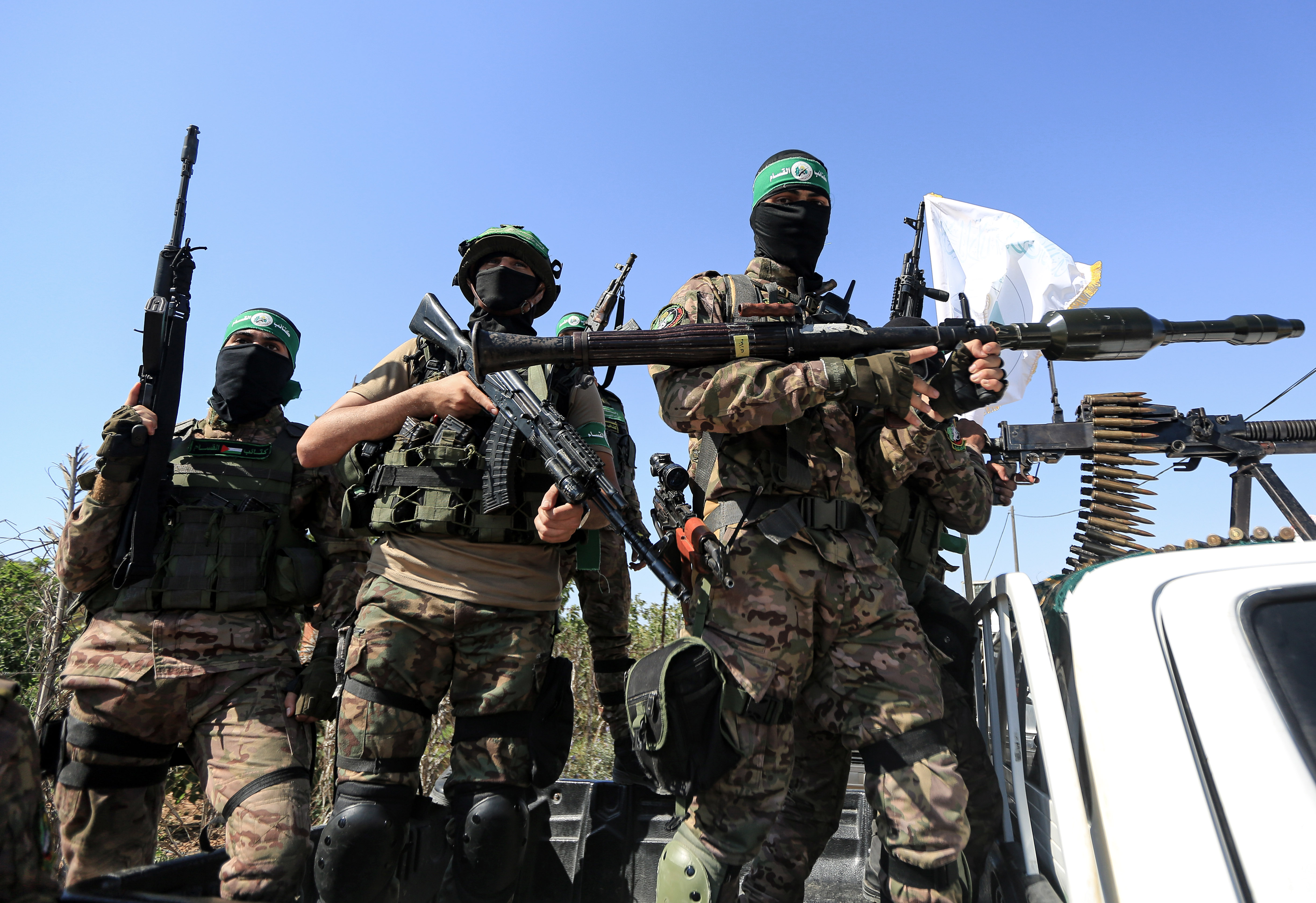 Palestinian fighters on truck