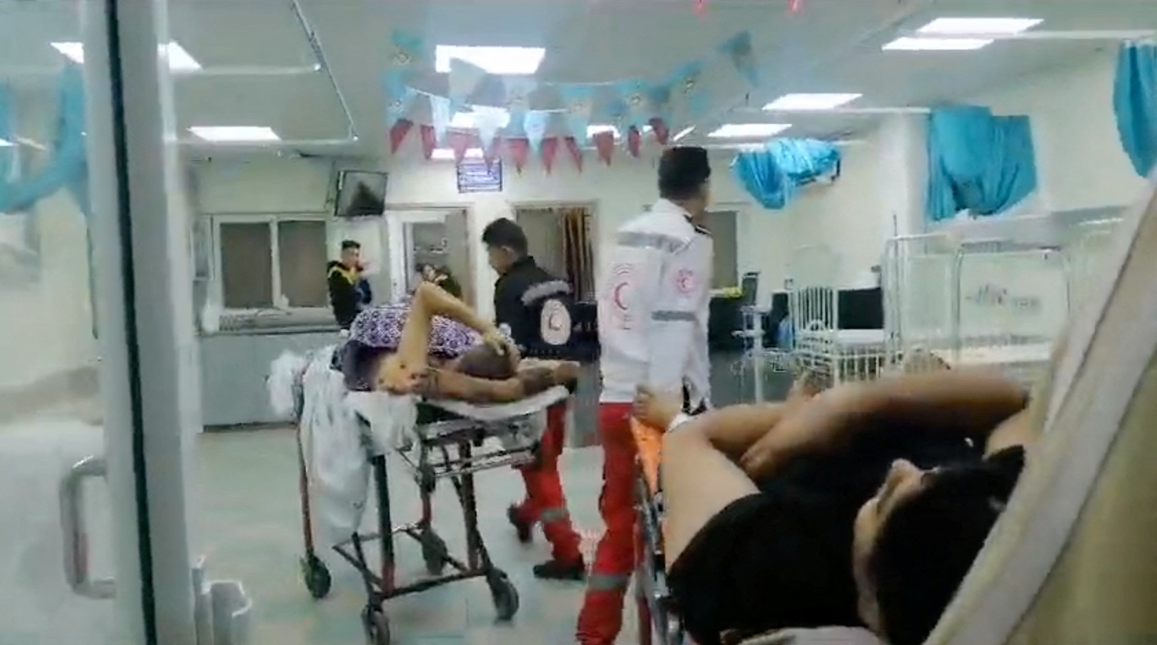 Evacuated patients from Shifa arrive at Gaza European Hospital in Khan Younis, in the southern Gaza Strip