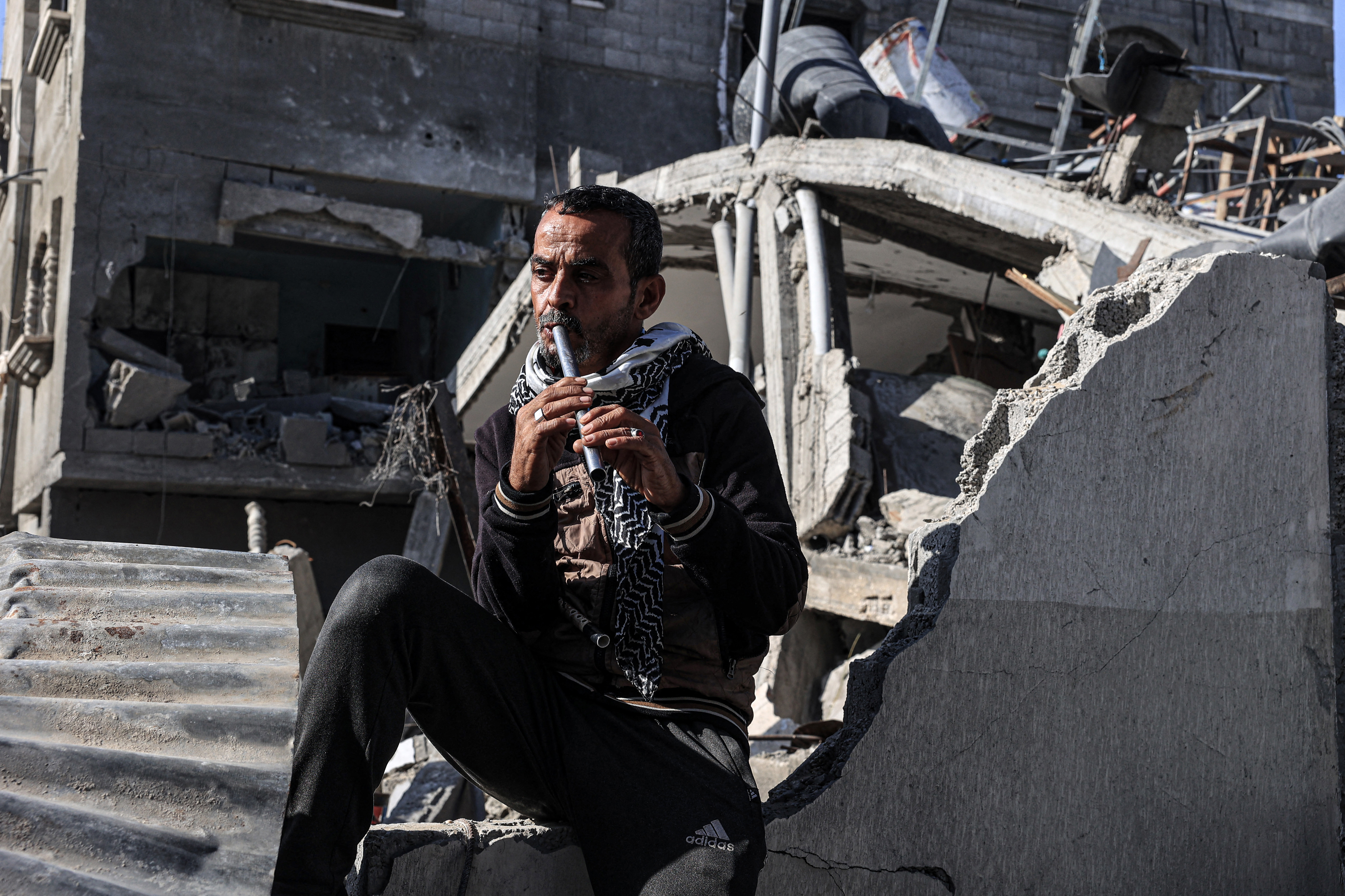 Imed, Amal al-Robayaa's husband, plays the ney 