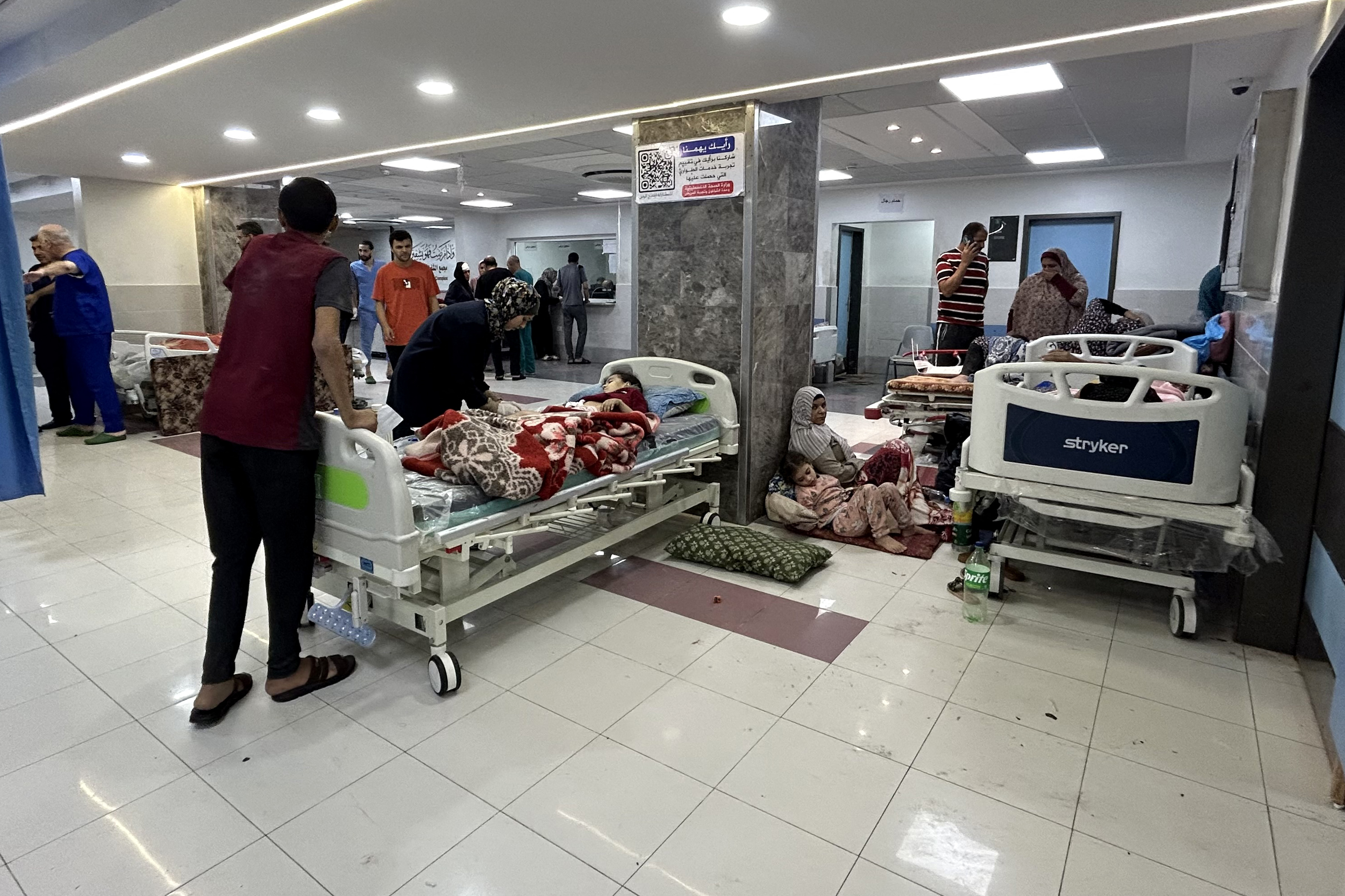 Medics and patients are pictured at Al-Shifa hospital in Gaza City