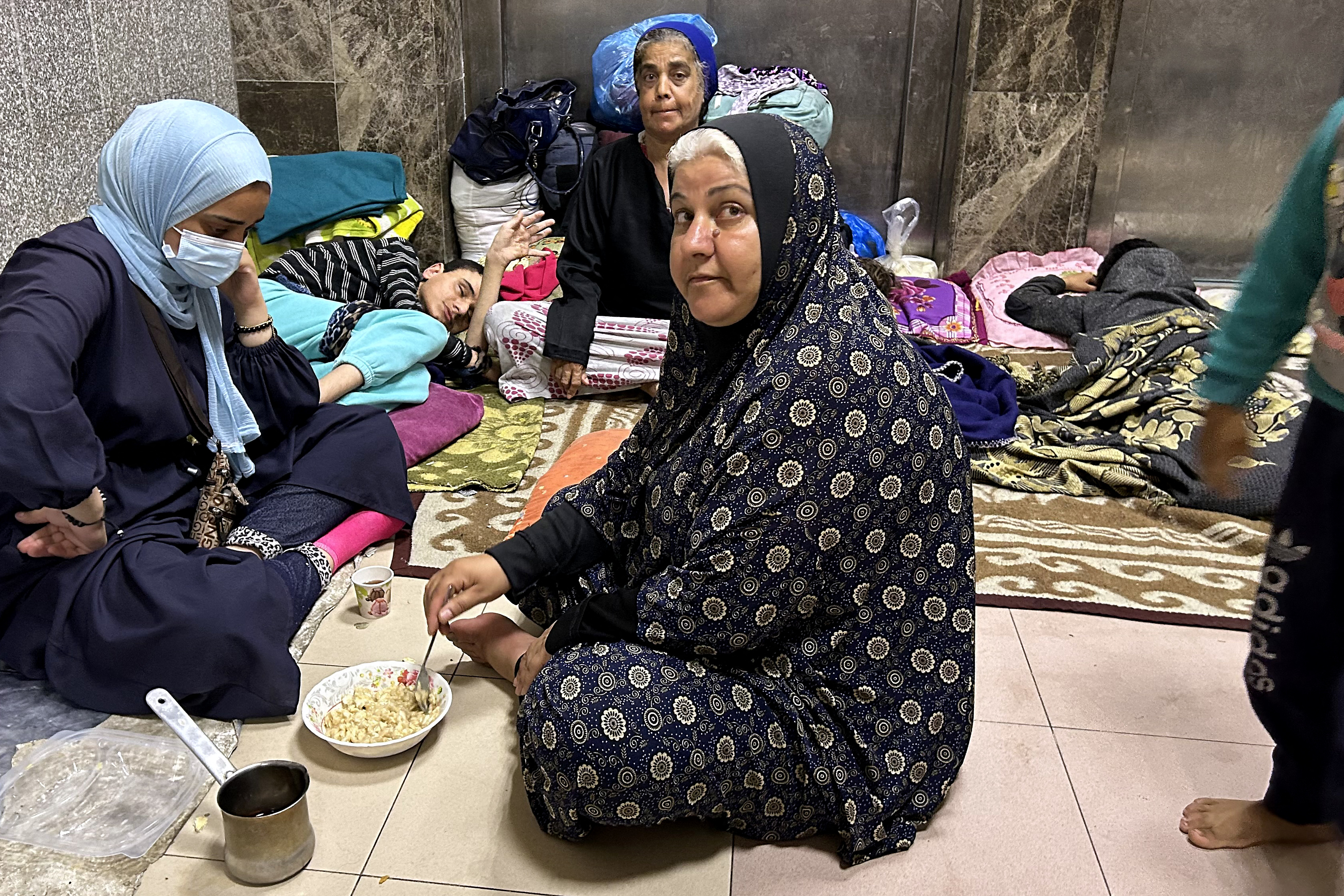 Internally displaced Palestinians are pictured at Al-Shifa hospital in Gaza City