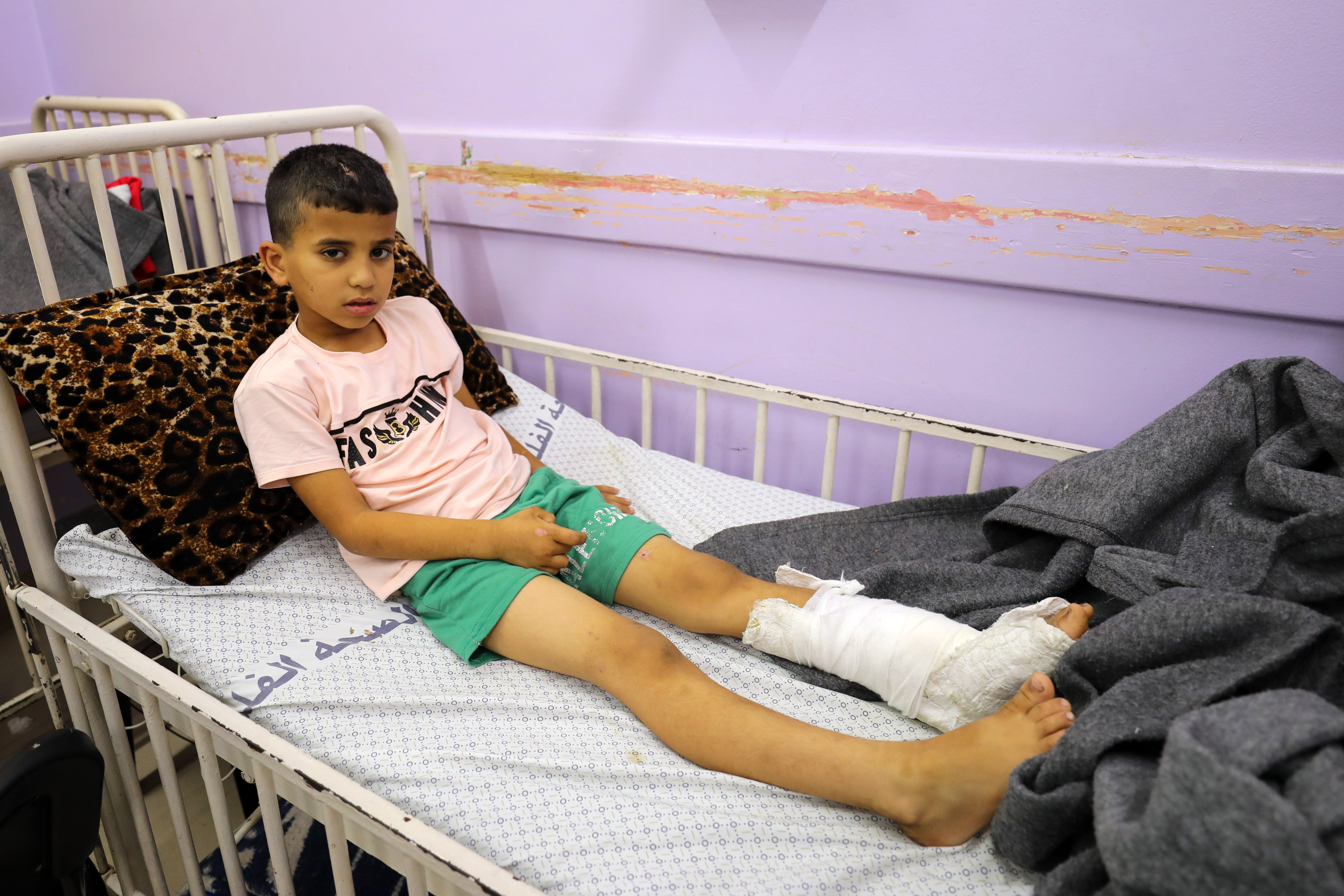 Eight-year-old Sa’ed al-Areer was playing in the street when Israeli warplanes bombed a house nearby, leaving him with a fractured skull and a broken leg