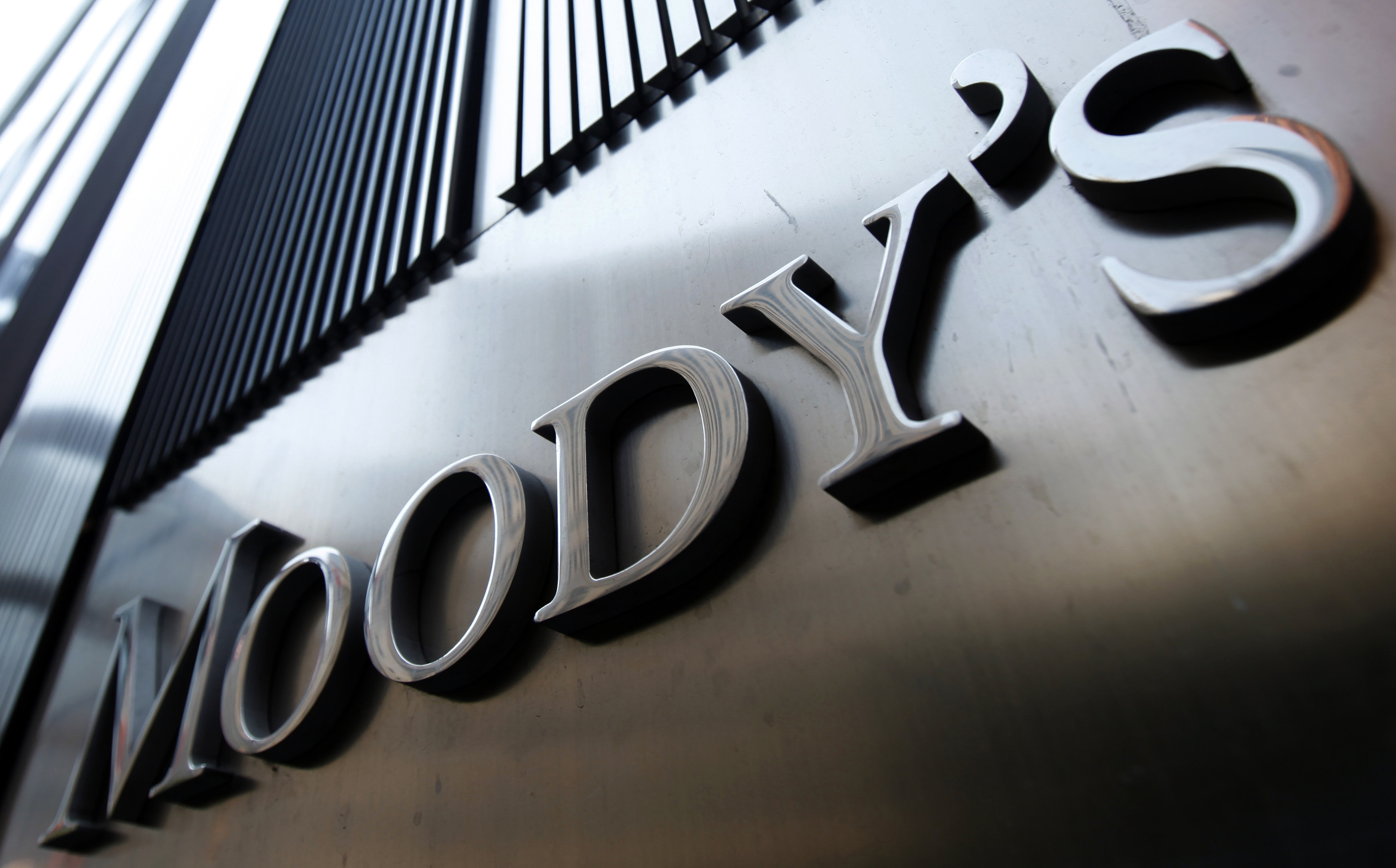 A Moody's sign on the 7 World Trade Center tower is photographed in New York [File: Mike Segar/Reuters]