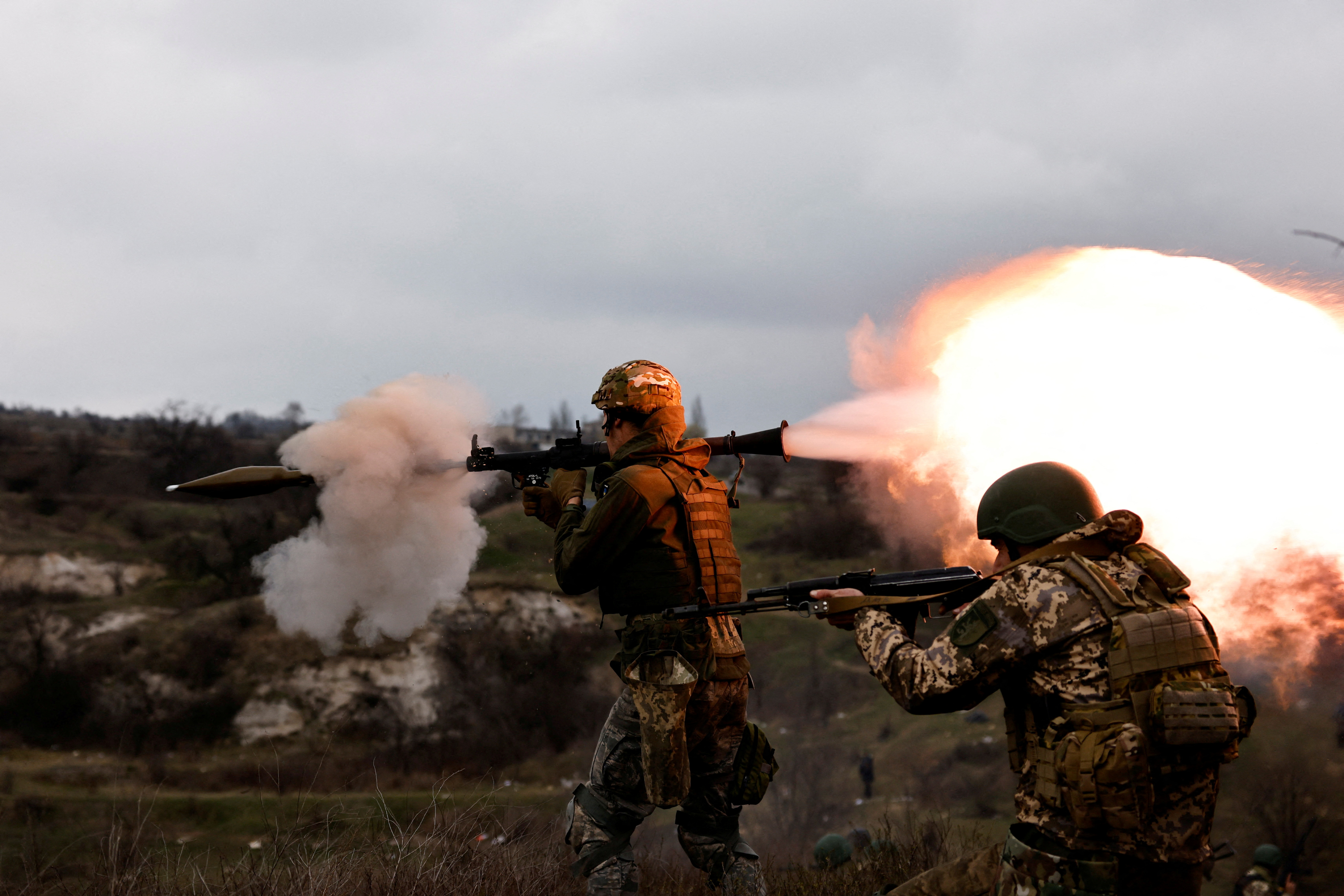 Ukrainian army brigade recruits take part in a military exercise