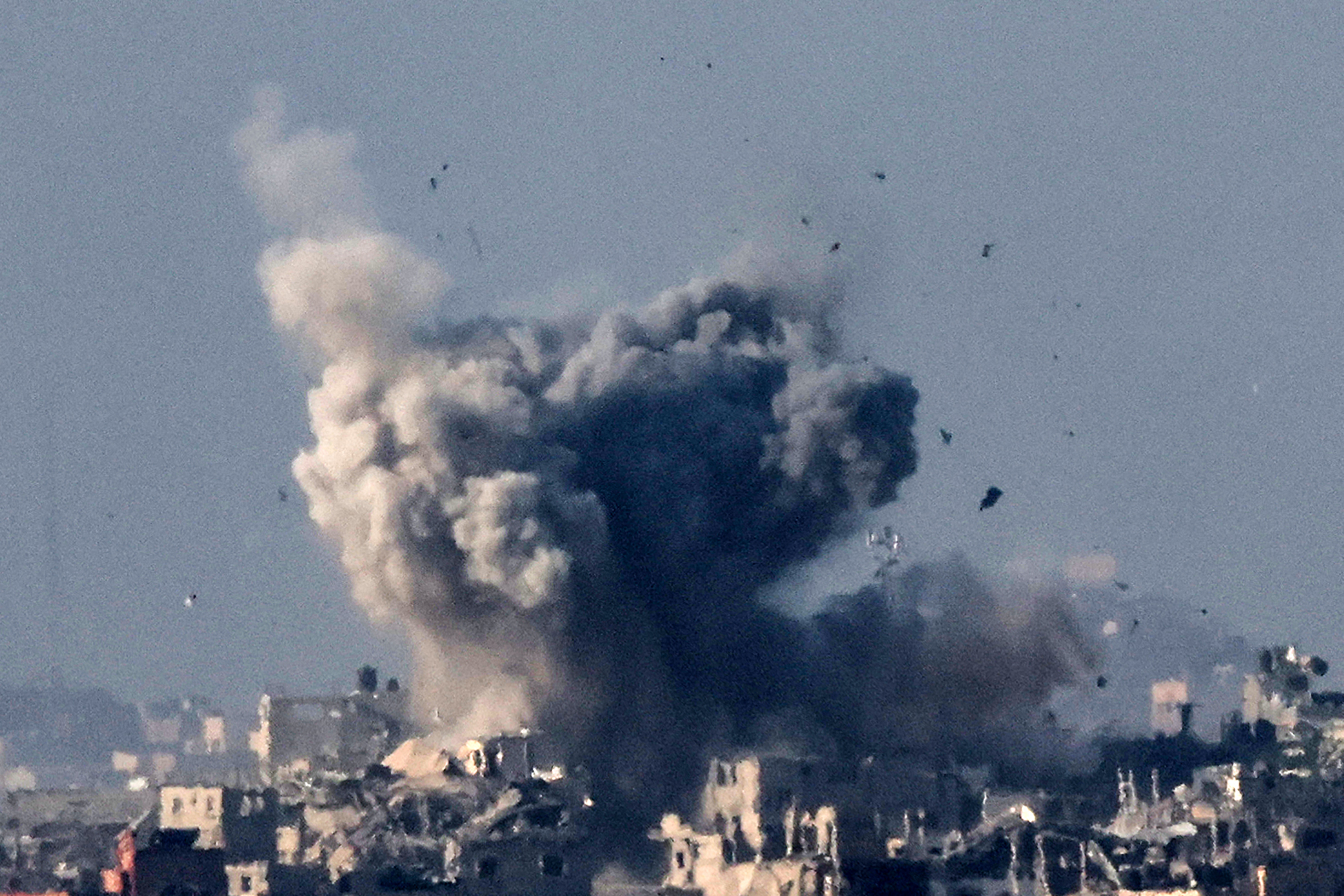 smoke billows into the air