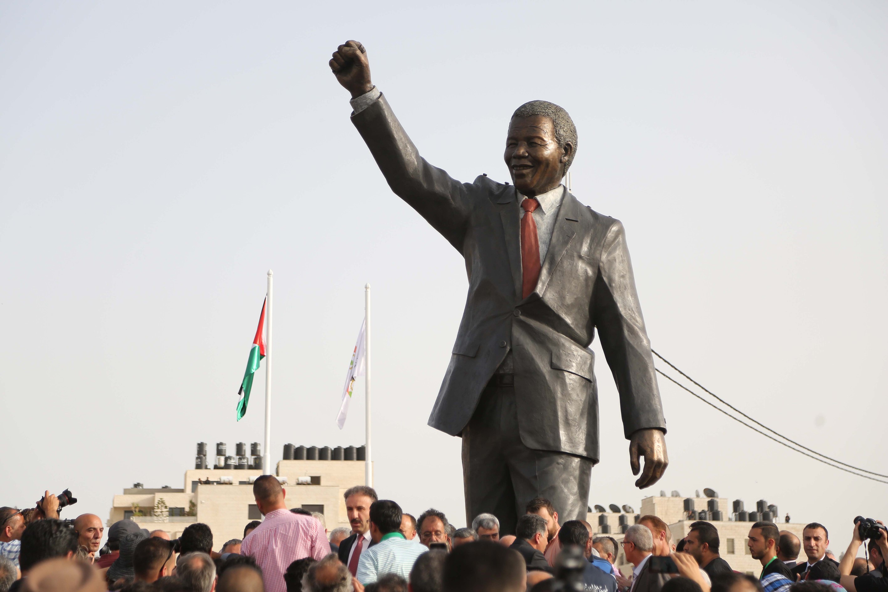 A sculpture of Nelson Mandela is seen after being erected during a ceremony attended by Palestinian President Mahmoud Abbas and other Palestinian ministers in Ramallah, West Bank on April 26, 2016