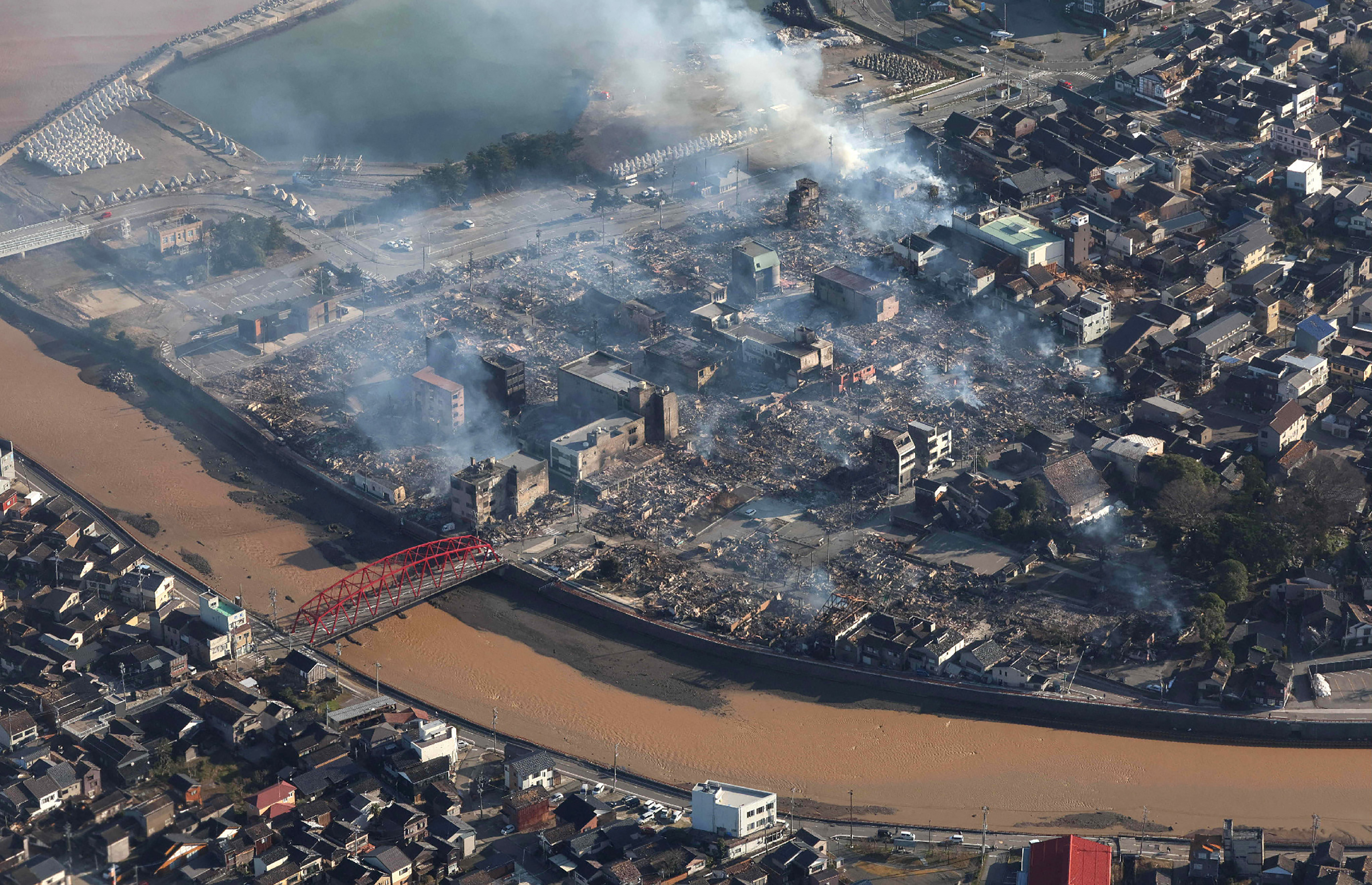 A huge fire burned near the port of Wajima following the earthquake before it was eventually extinguished [Jiji Press via AFP]