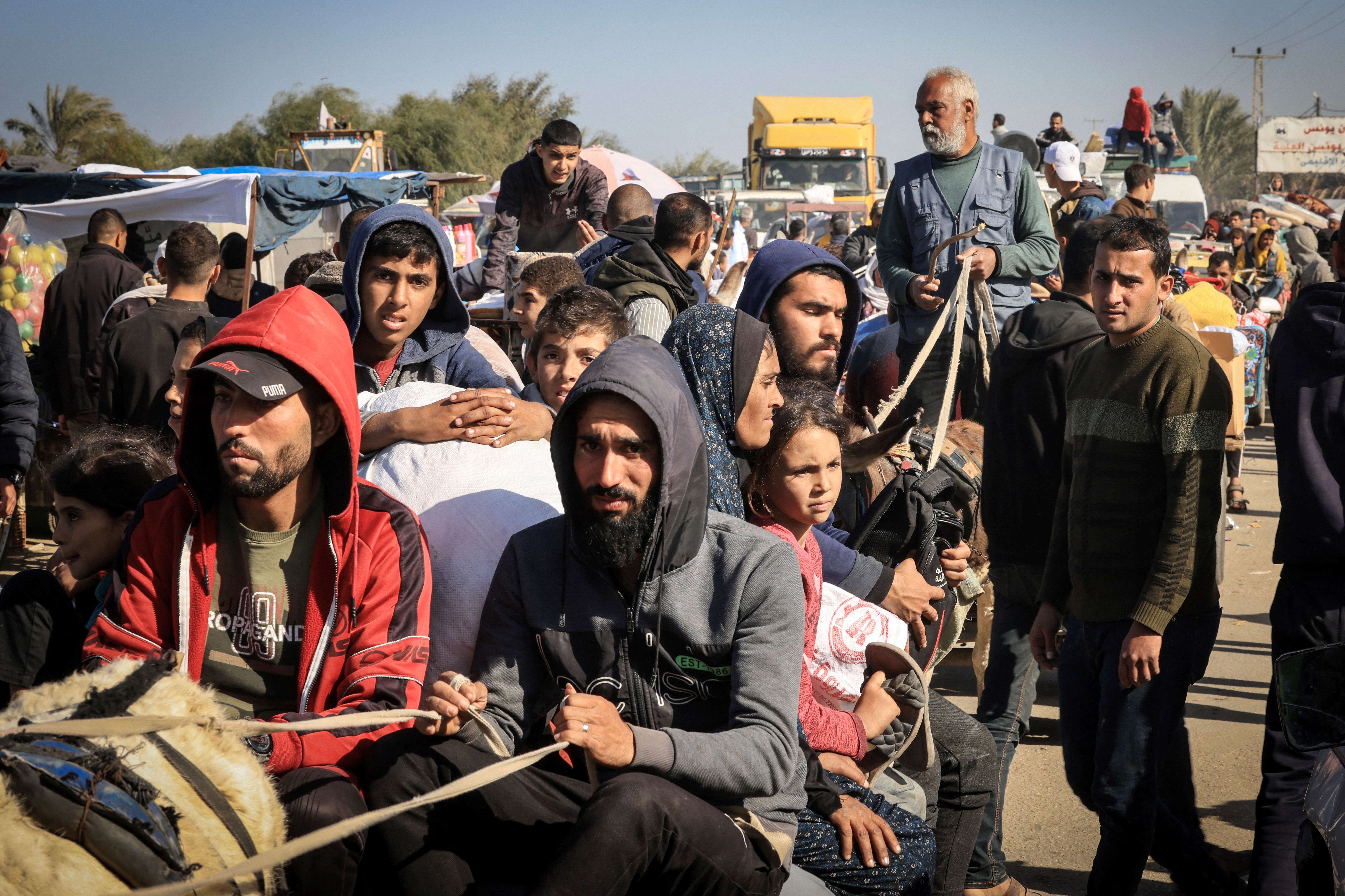 Palestinian families fleeing the city on the coastal road leading to Rafah