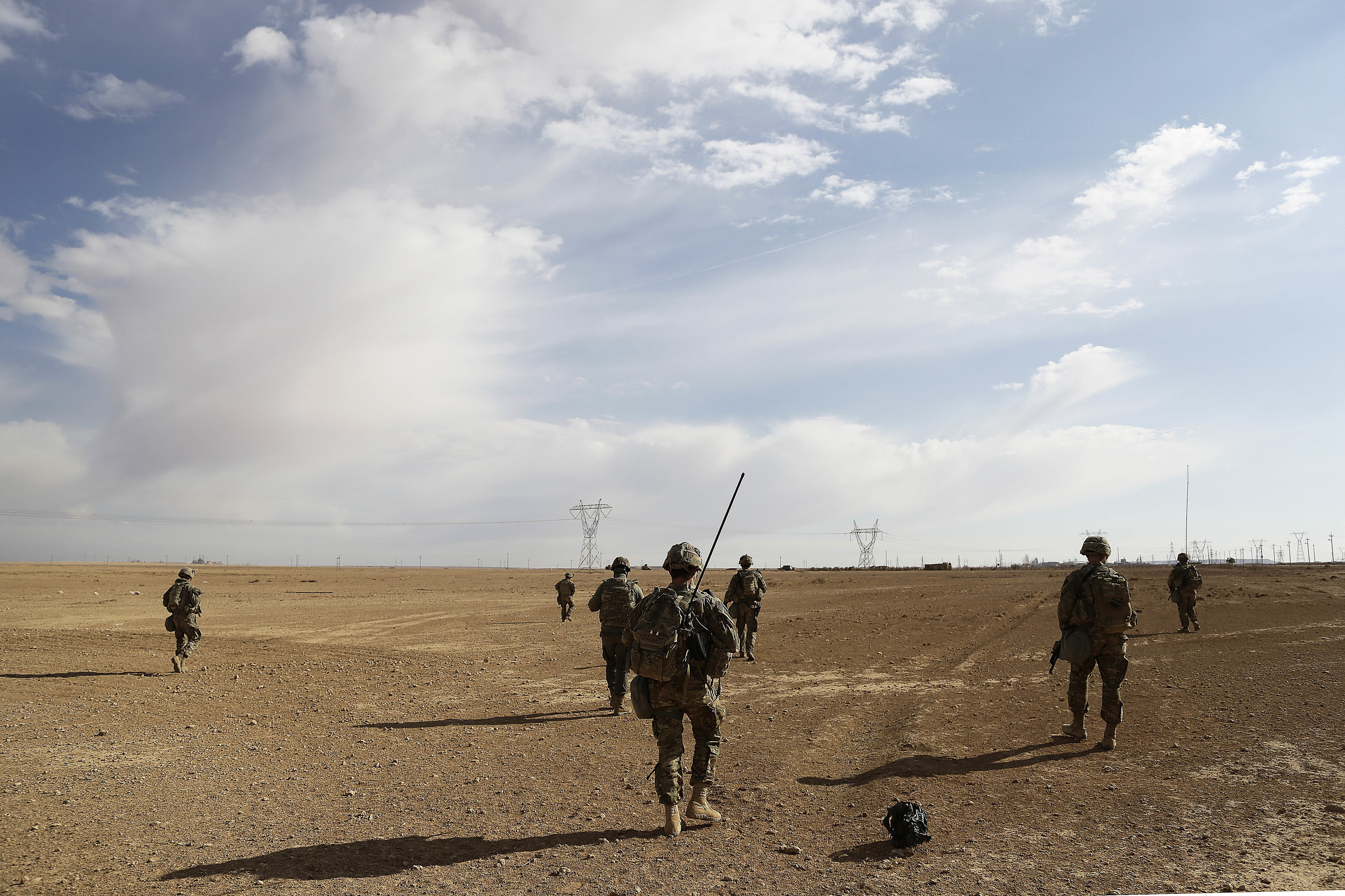 U.S. Army soldiers on a reconnaissance patrol in a rural village near a coalition outpost in western Iraq.