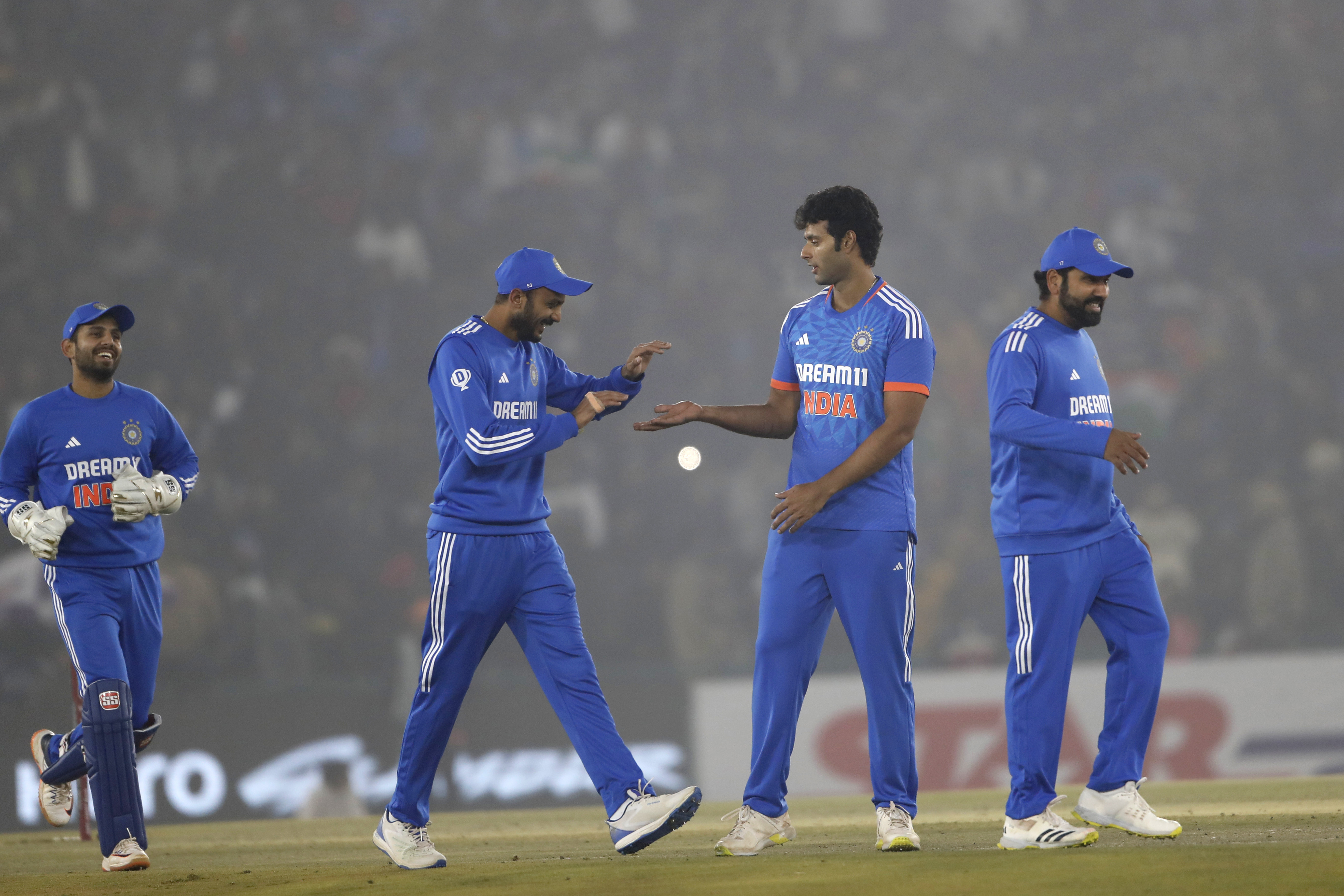 Shivam Dube of India, without cap, celebrates the wicket of Ibrahim Zadran during the first T20 cricket match between India and Afghanistan in Mohali, India