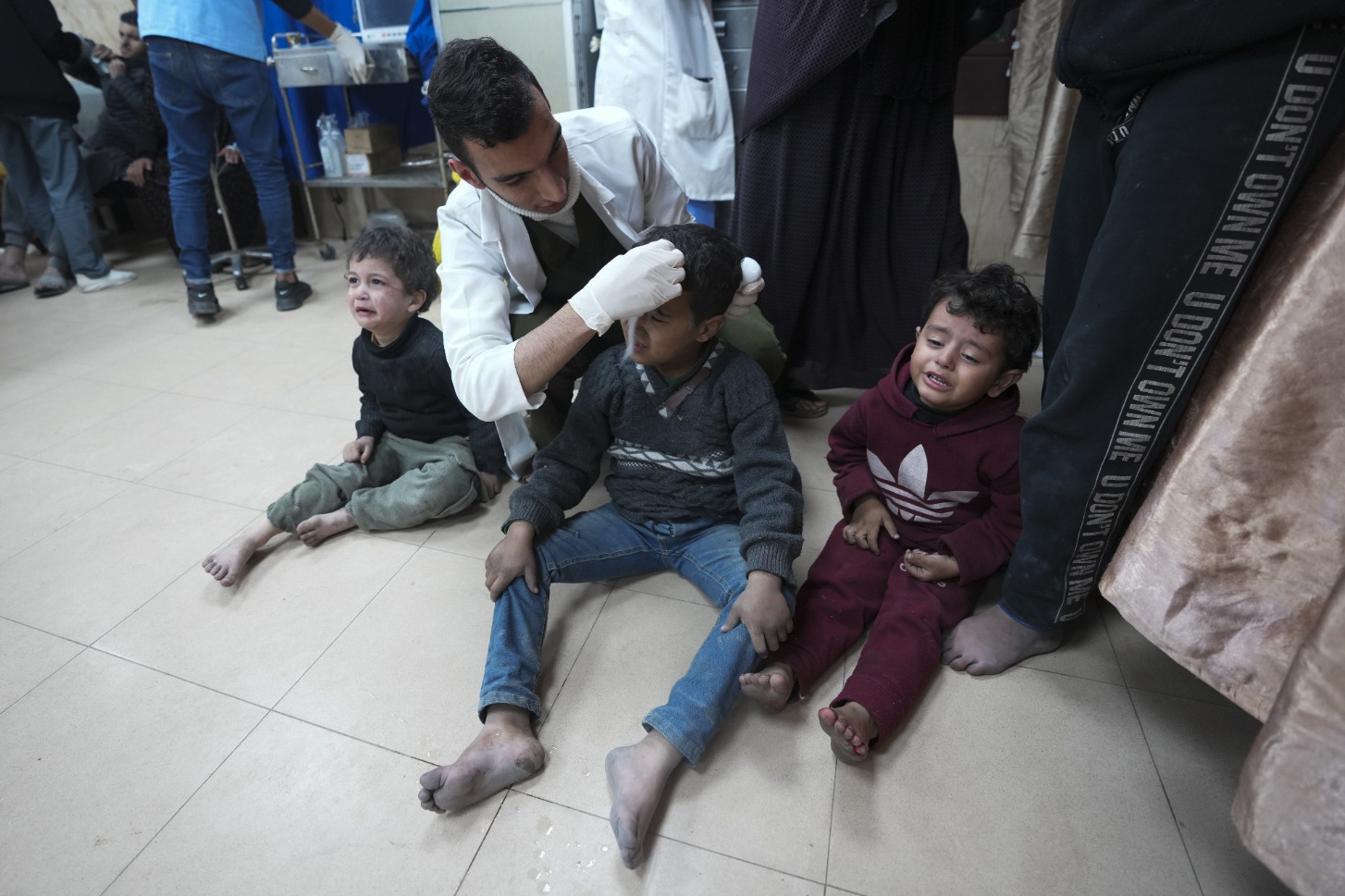 Palestinians wounded in the Israeli bombardment of the Gaza Strip are treated in a hospital in Deir al Balah on Sunday.