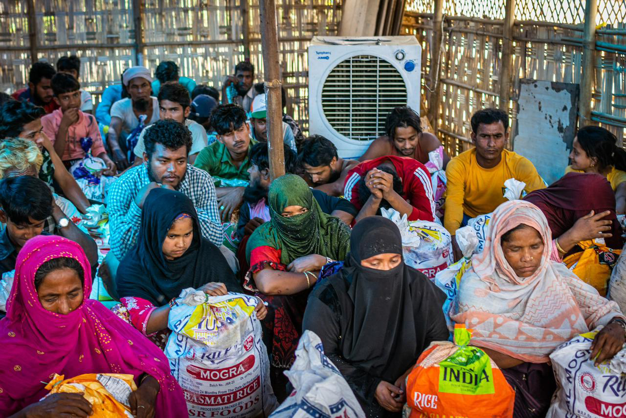 Rohingya men and women at a shelter in New Delhi [Handout via Al Jazeera]
