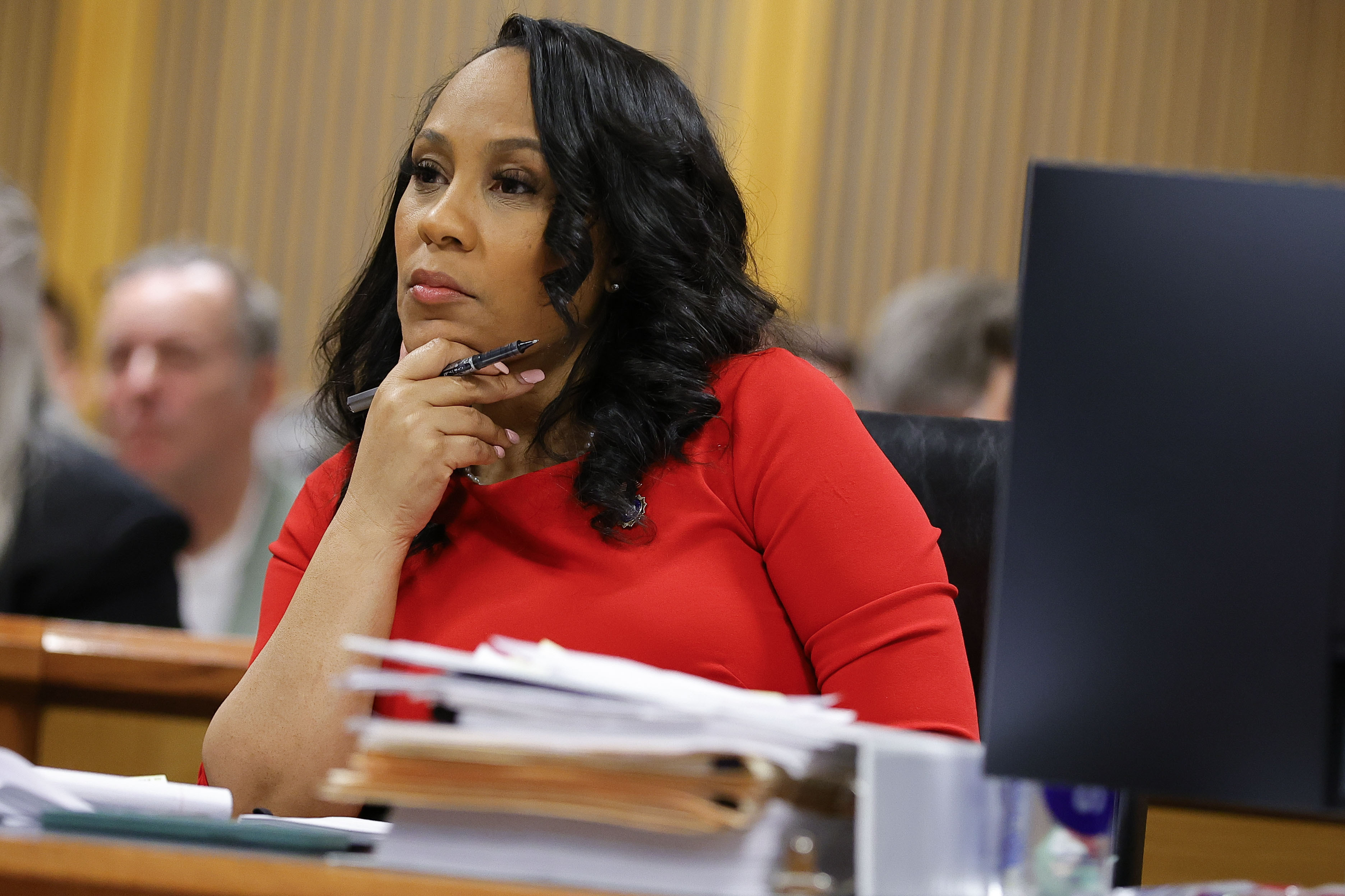 Fulton County District Attorney Fani Willis looks on during a hearing on the Georgia election interference case in Atlanta, Georgia