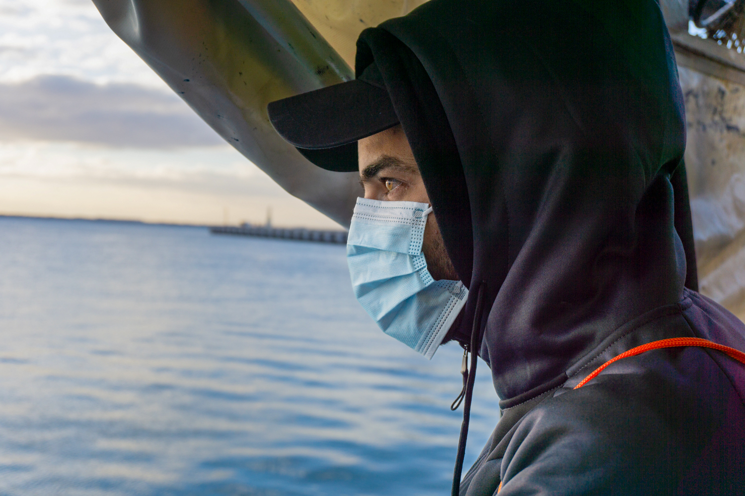 'Malik' says he fled Syria to avoid serving in the military, and to provide a better life for his family [Nora Adin/Al Jazeera]