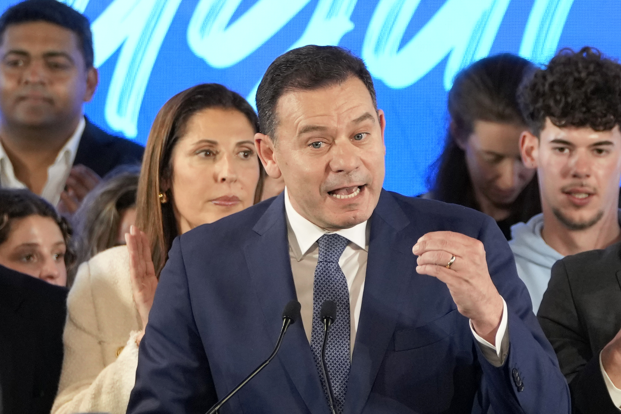 Luis Montenegro, leader of the centre-right Democratic Alliance, delivers a speech to supporters claiming victory in Portugal's election, in Lisbon, on March 11, 2024 [Armando Franca/AP]