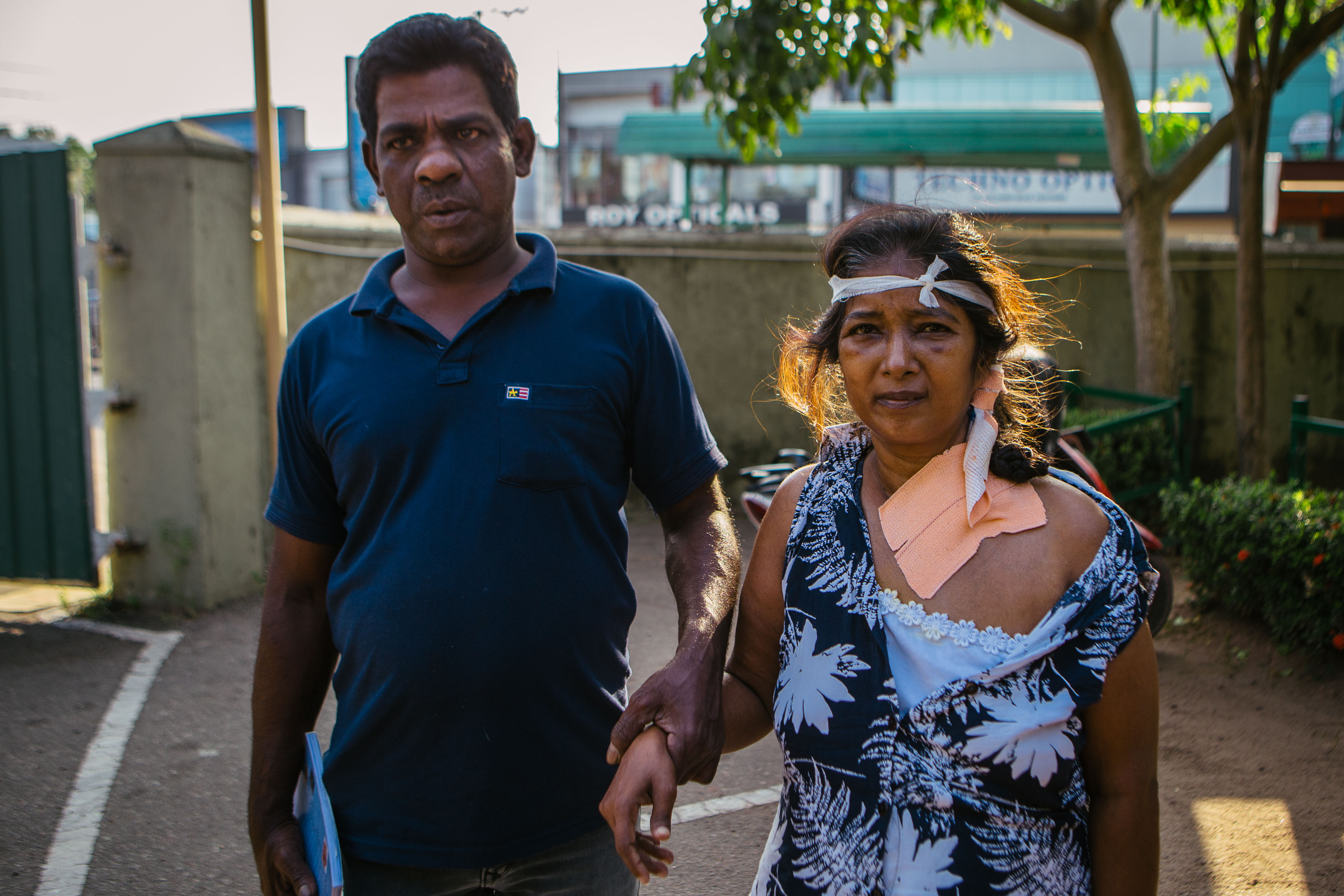 Sirani Silva, 48, a patient with acute kidney damage who attends the District General Hospital in Negombo on Sri Lanka’s west coast for regular treatment, is accompanied by her husband as she is so weak