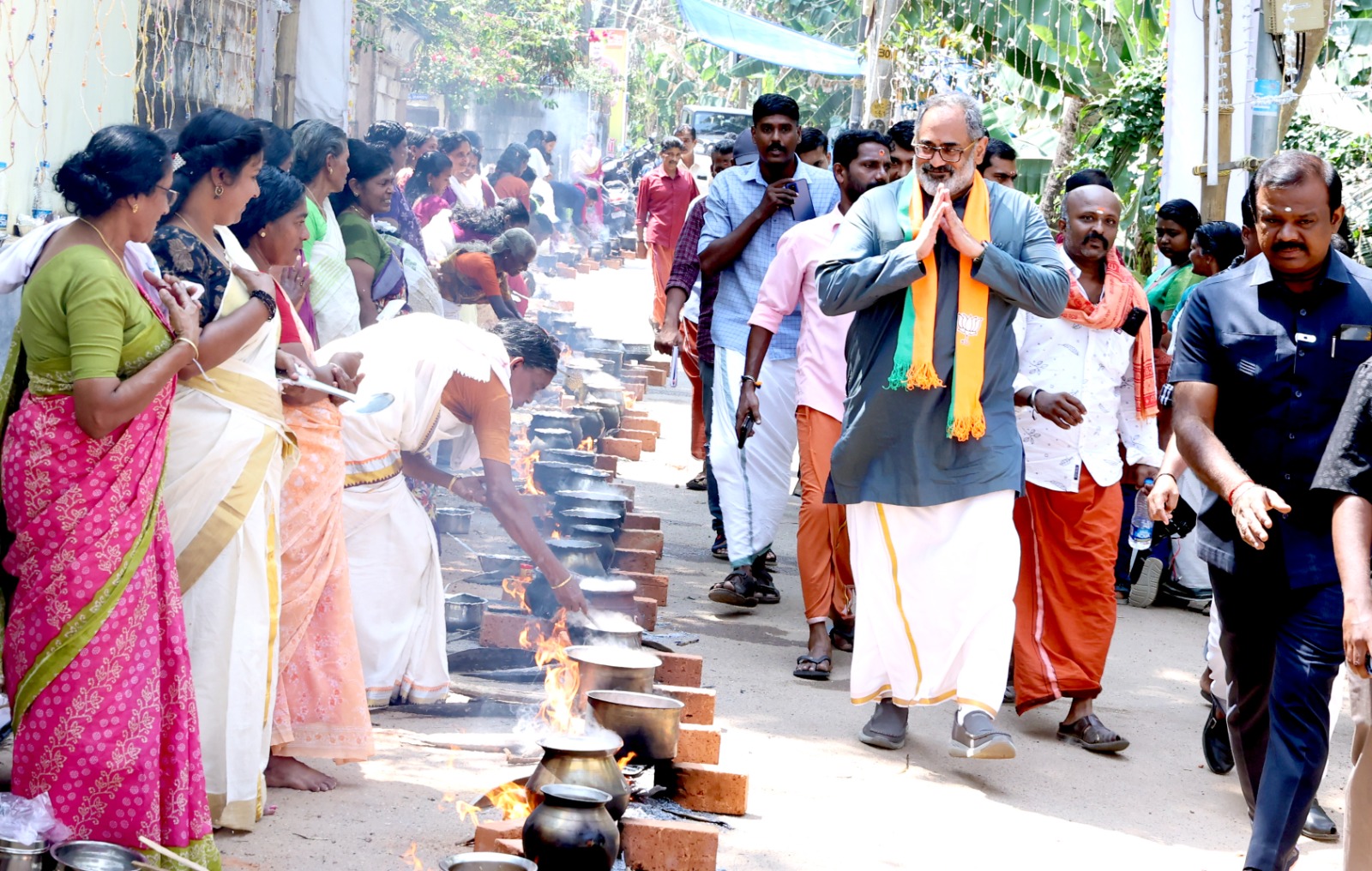 Chandrasekhar greets devotees at a Hindu temple in Thiruvananthapuram